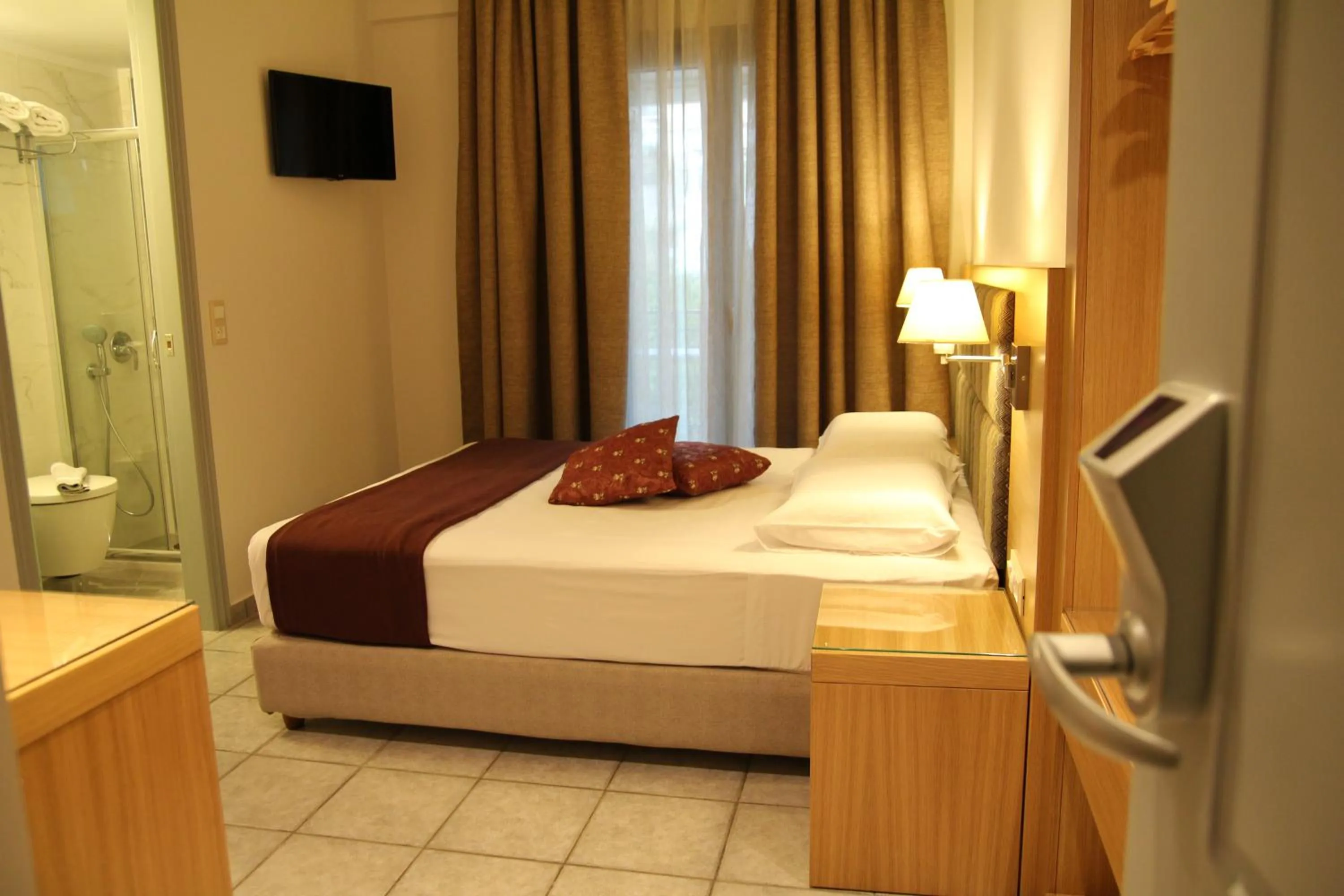 Bed in Achilles Hotel