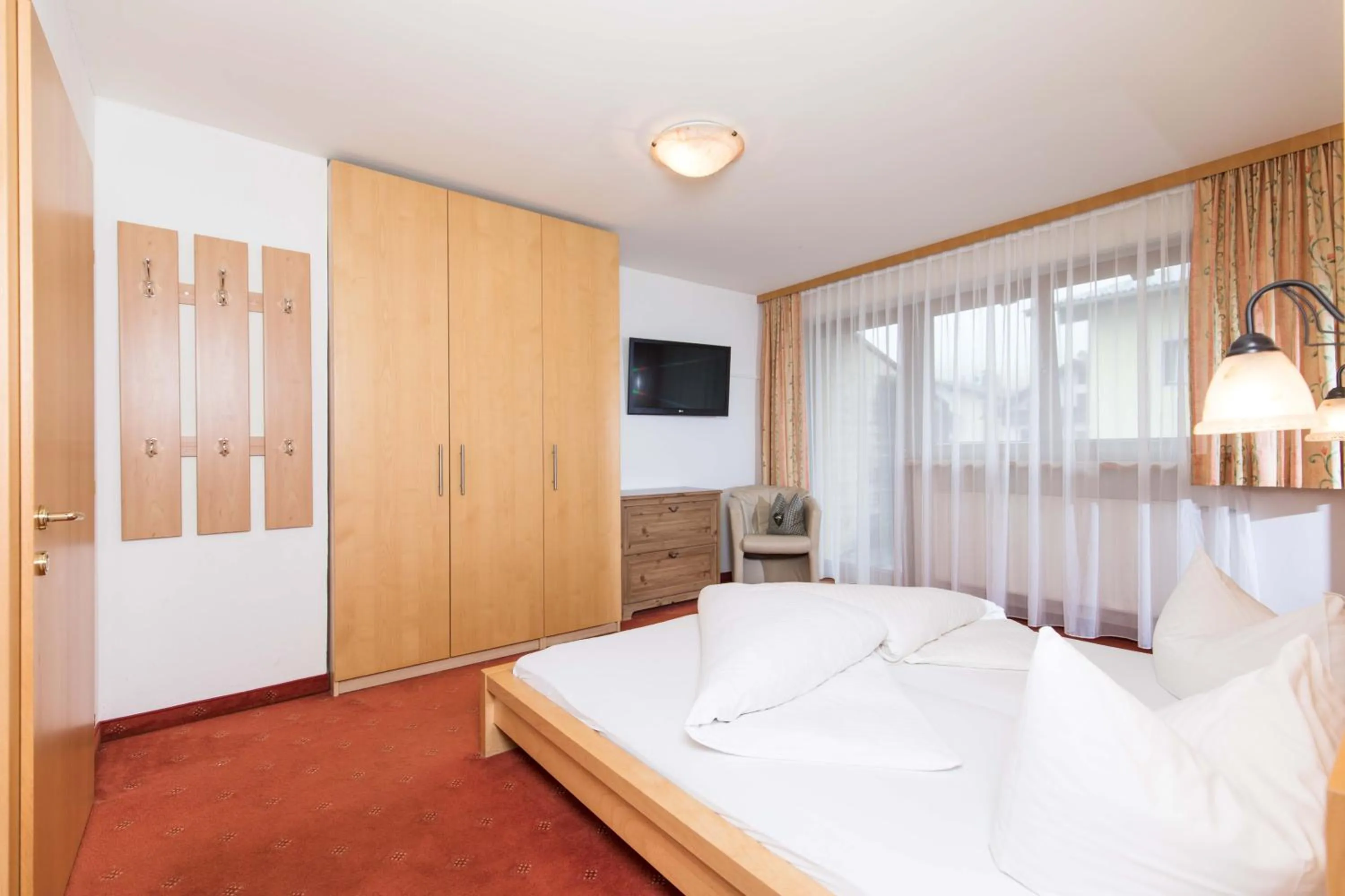 Photo of the whole room, Bed in Hotel Stockerwirt