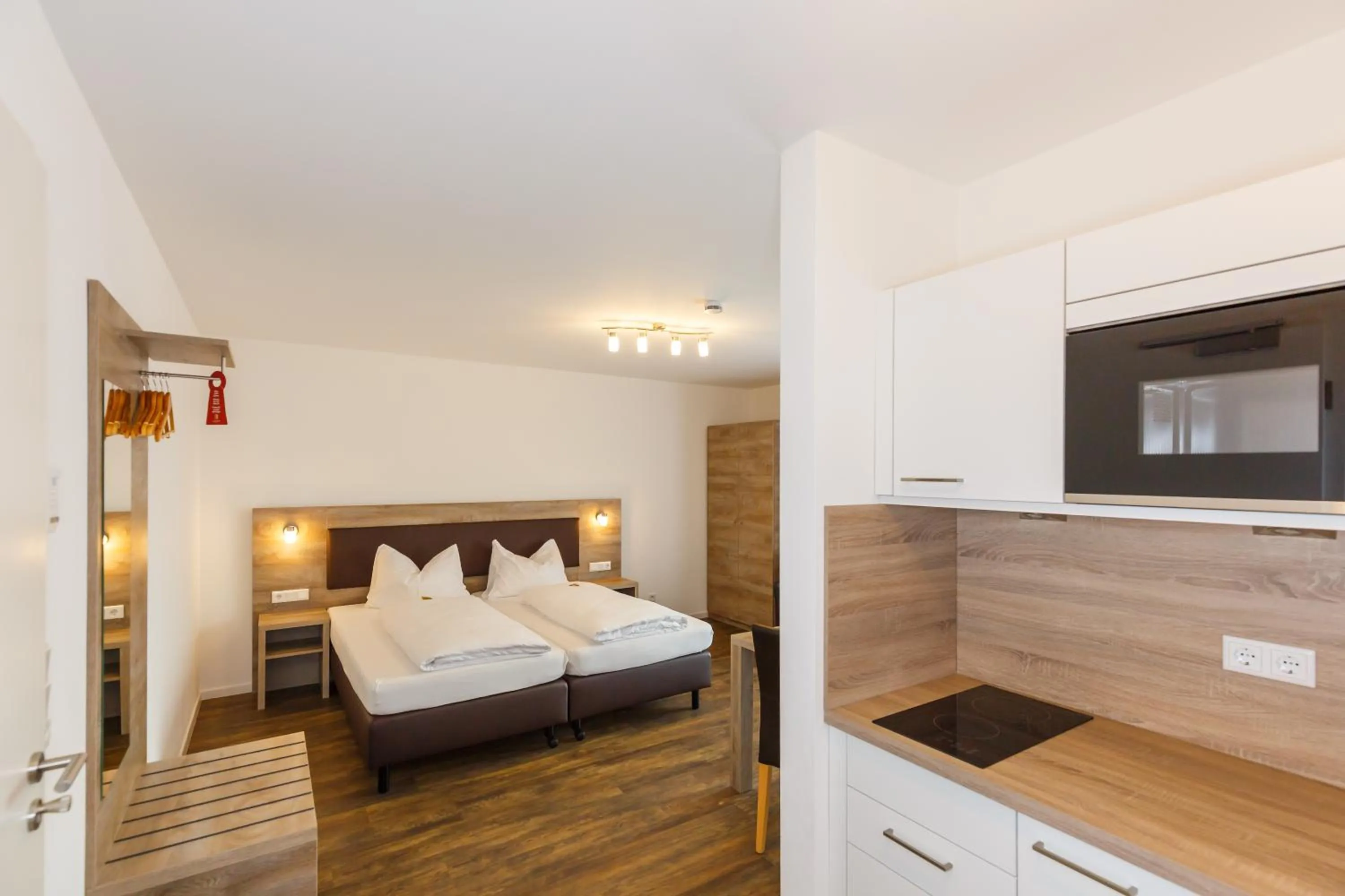 Photo of the whole room, Bed in Come IN Comfort