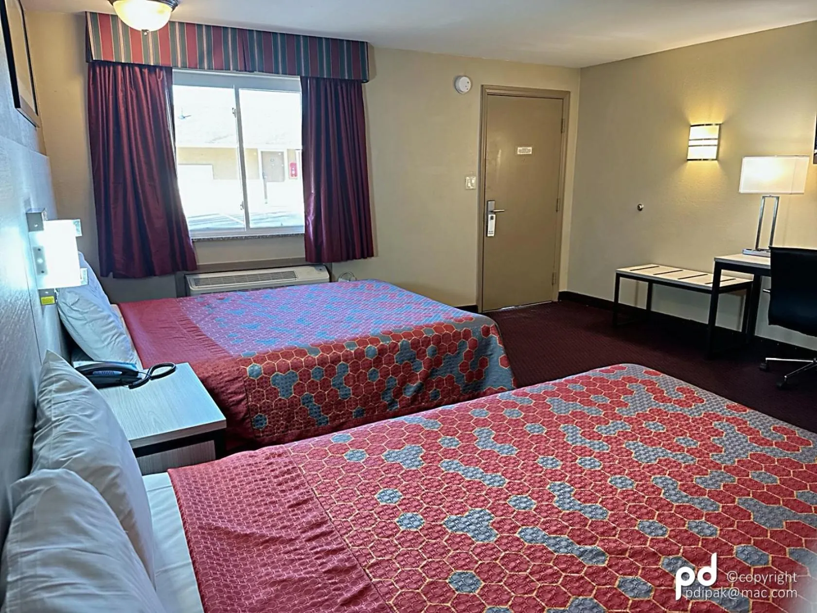 Bed in Travel Inn & Suites Flemington