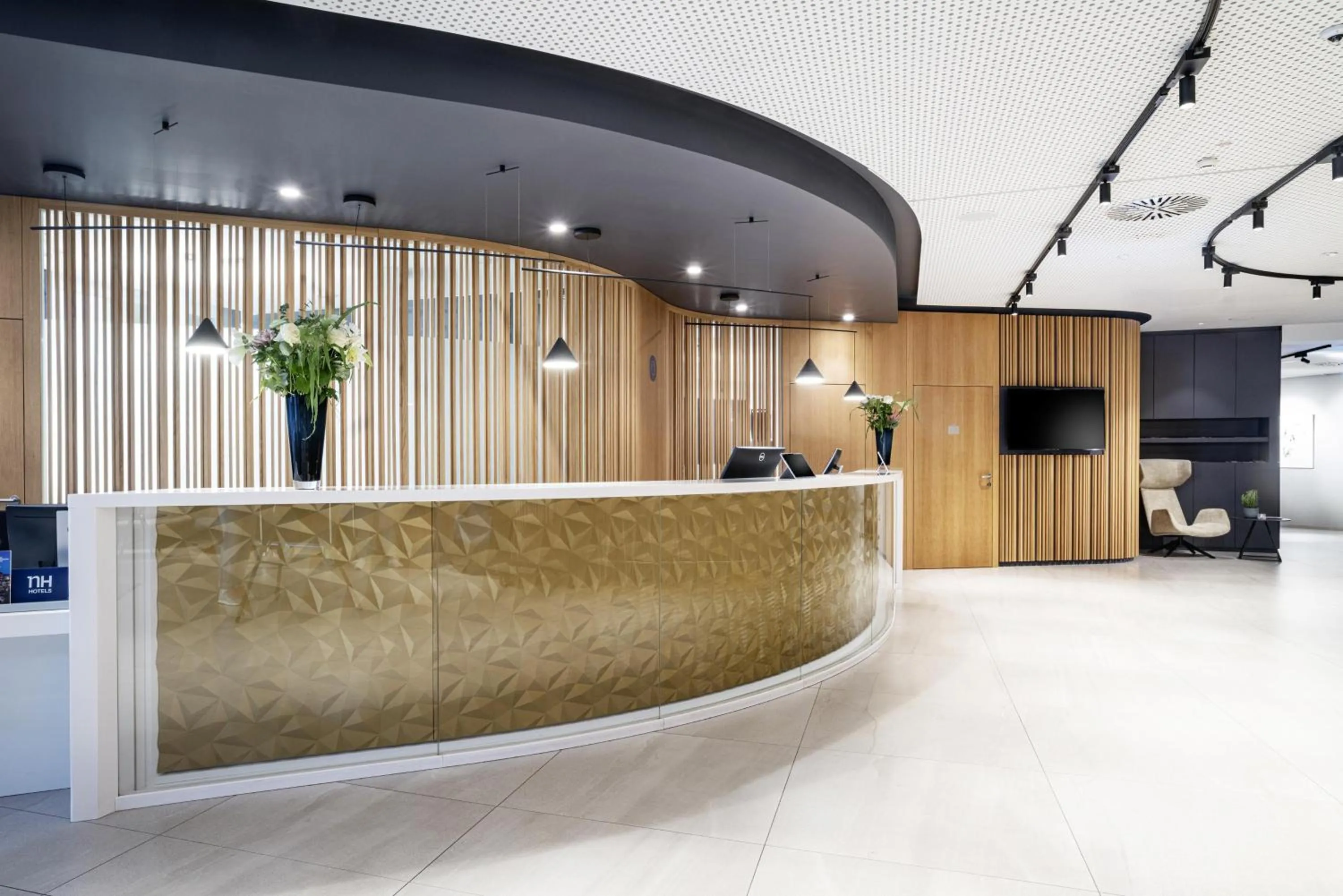 Lobby or reception in NH Graz City