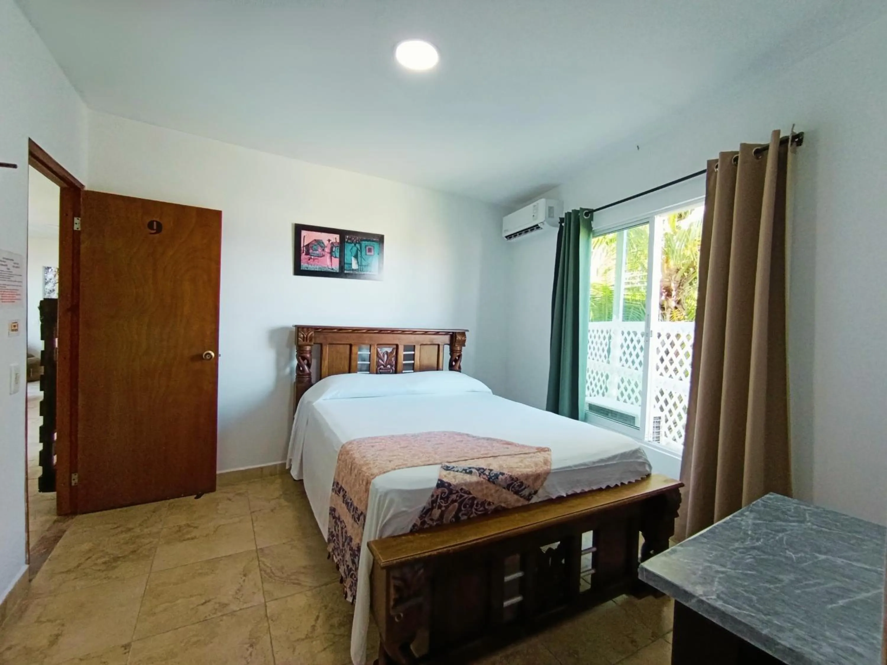 Photo of the whole room, Bed in The Rock House Eco