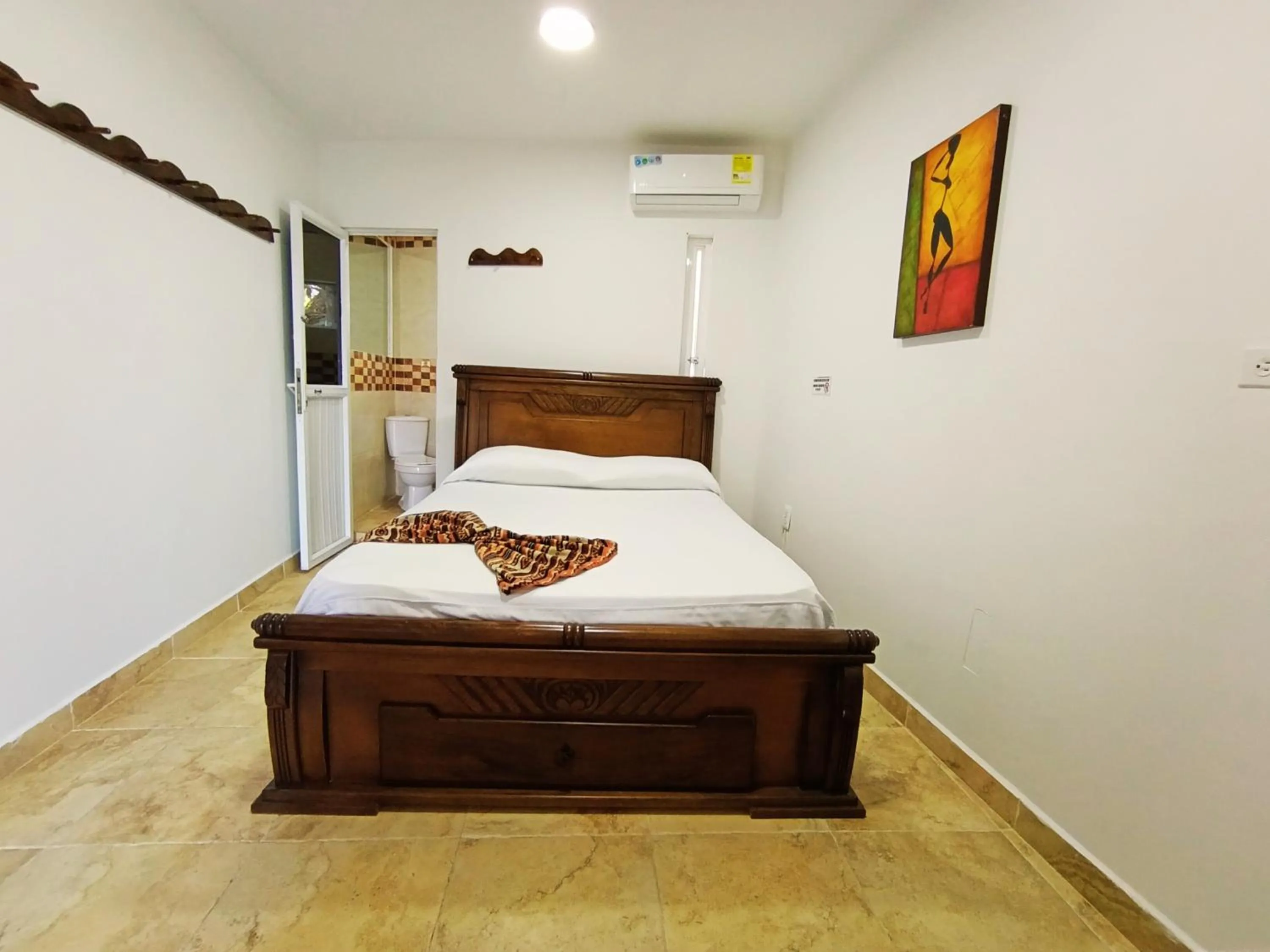 Photo of the whole room, Bed in The Rock House Eco