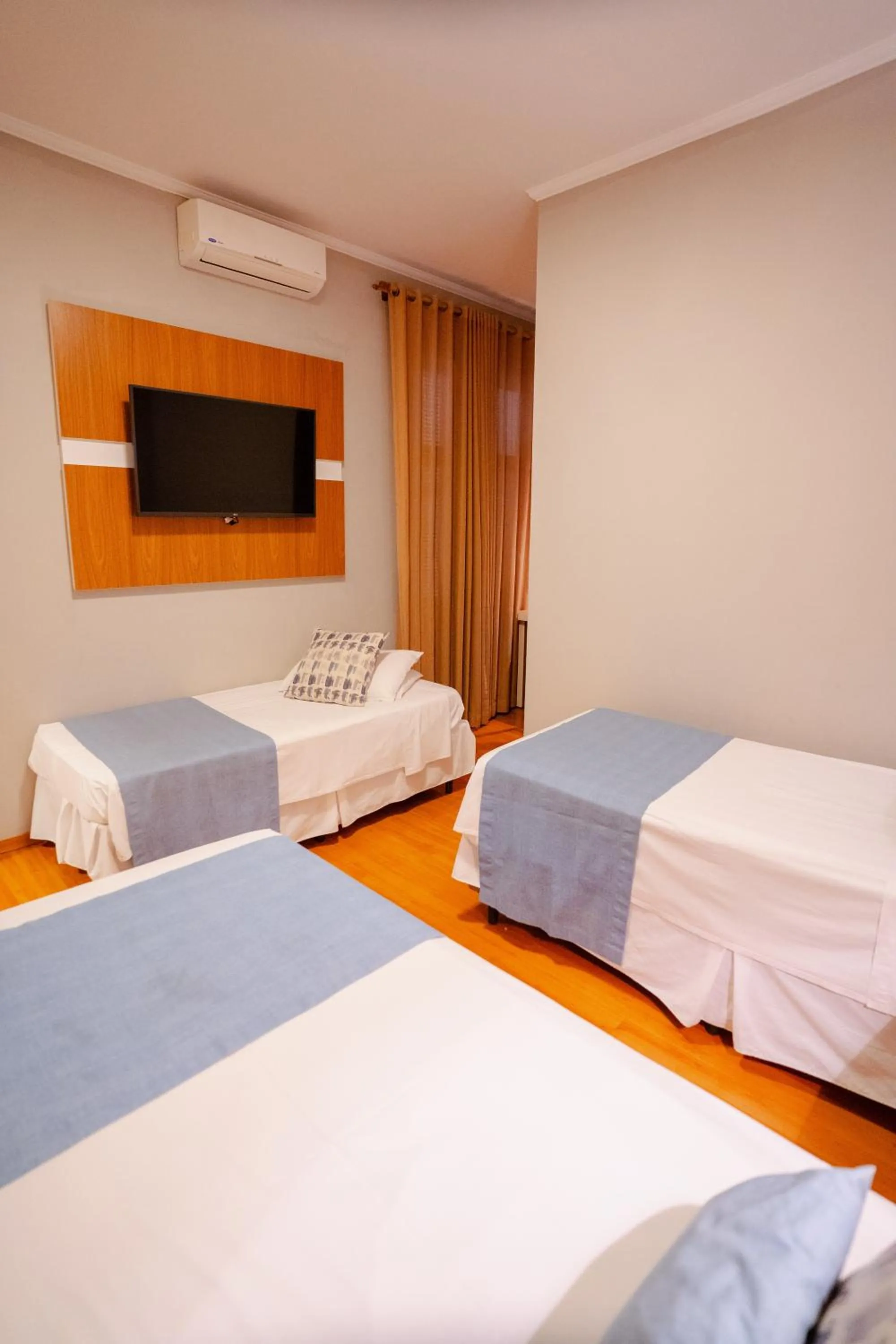 Bed in Hotel Minas Gerais