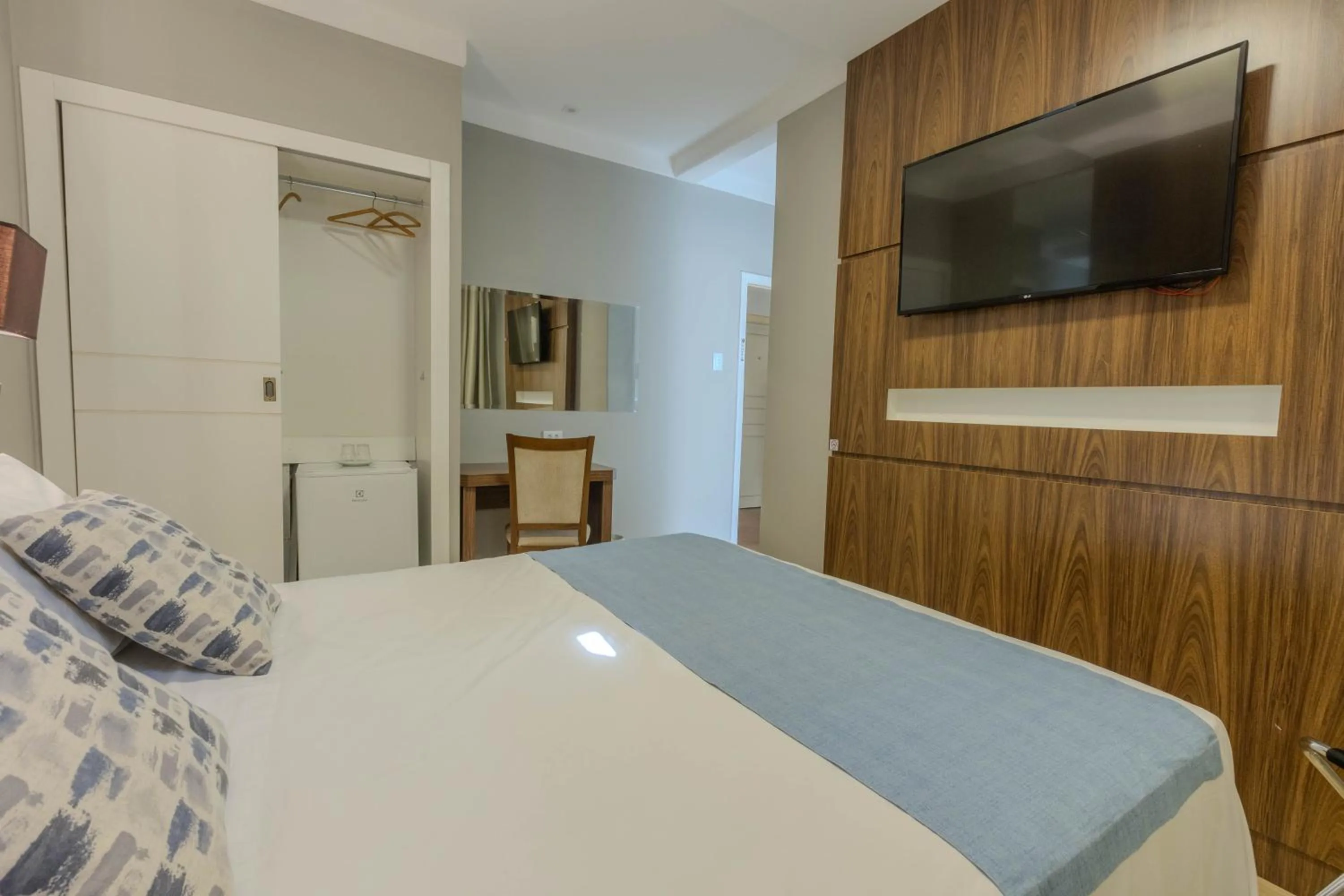 Bed in Hotel Minas Gerais