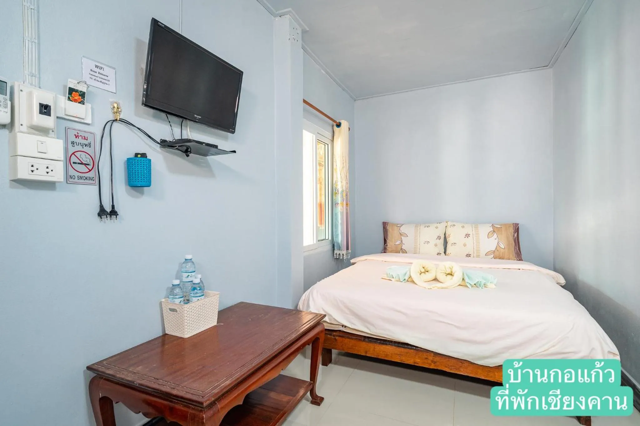 Bed in Baan Kokaew Chiang Khan