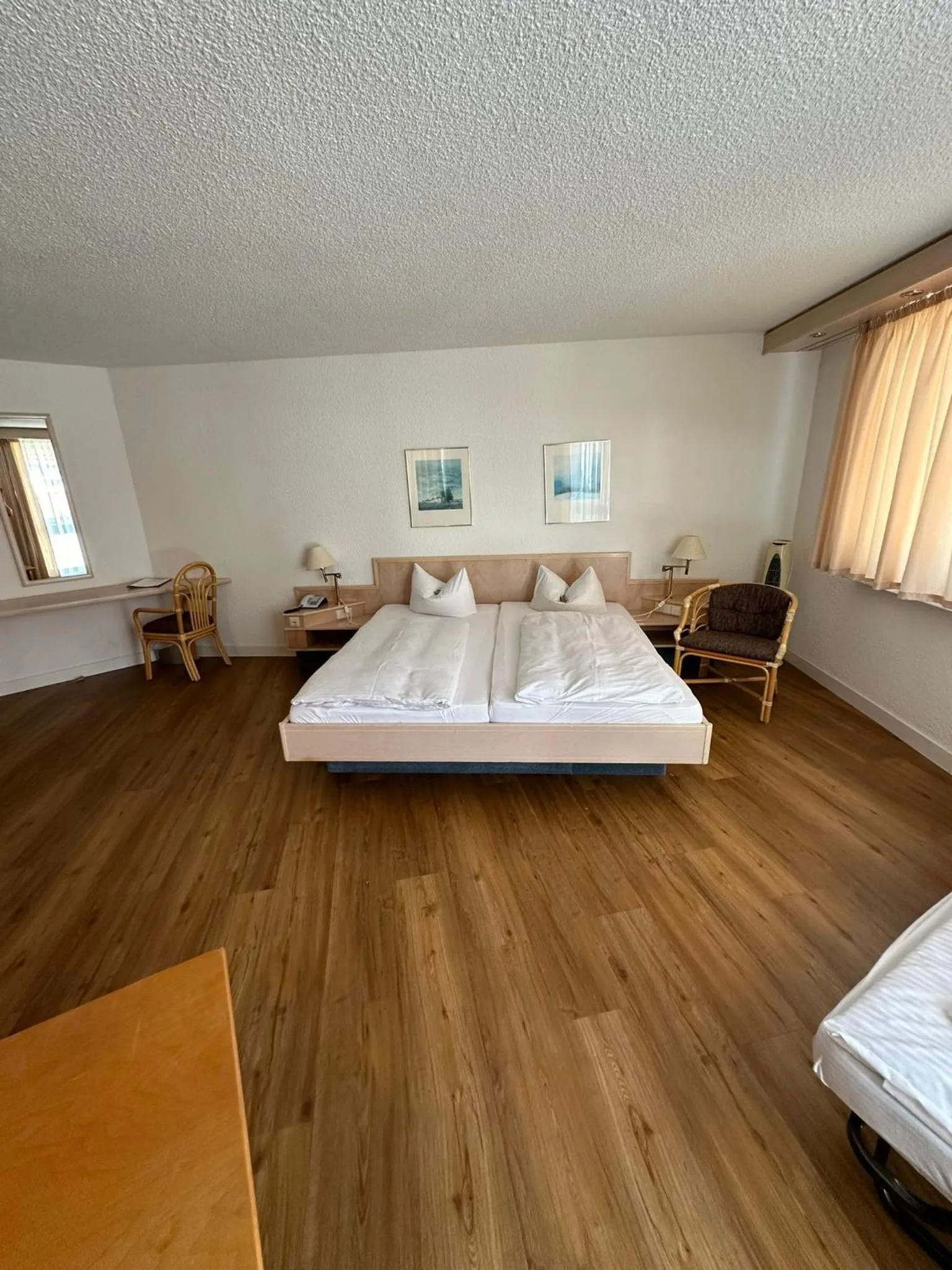 Photo of the whole room, Bed in Hotel Aichtaler Hof