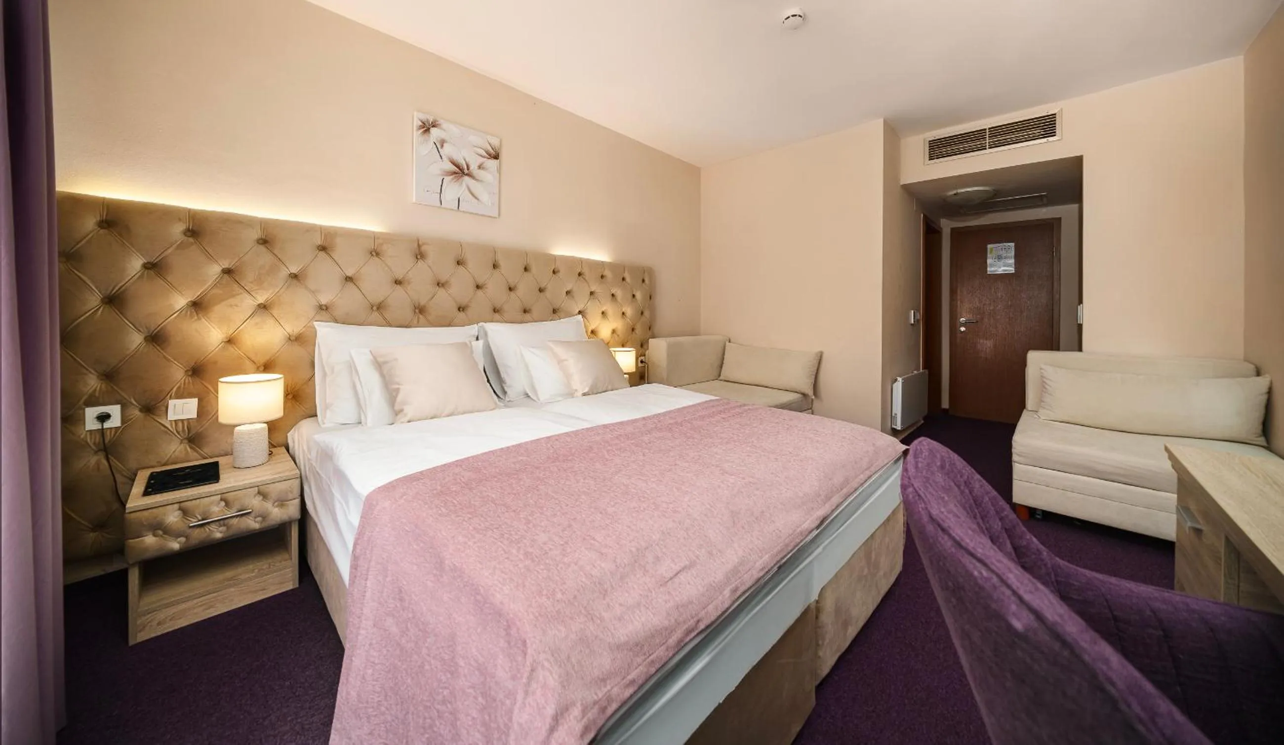 Bedroom in Hotel Stella Maris - Style & Comfort