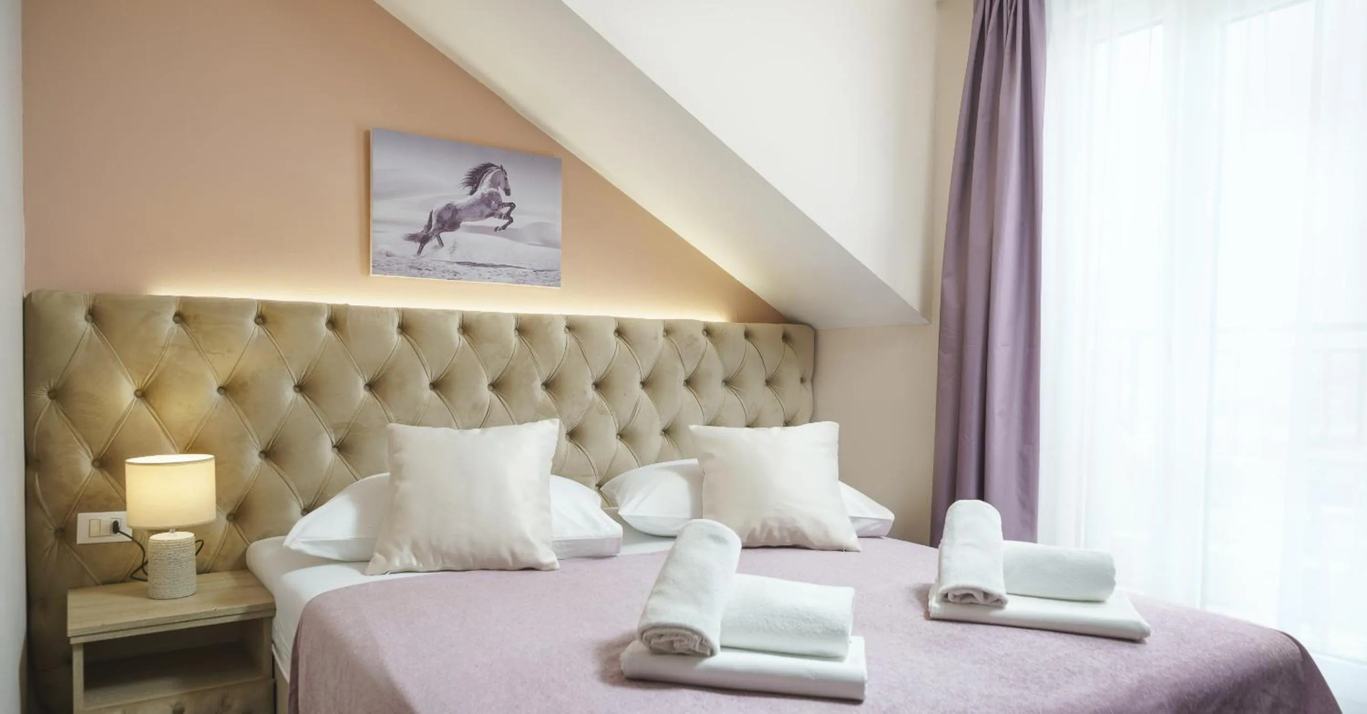 Bed in Hotel Stella Maris - Style & Comfort