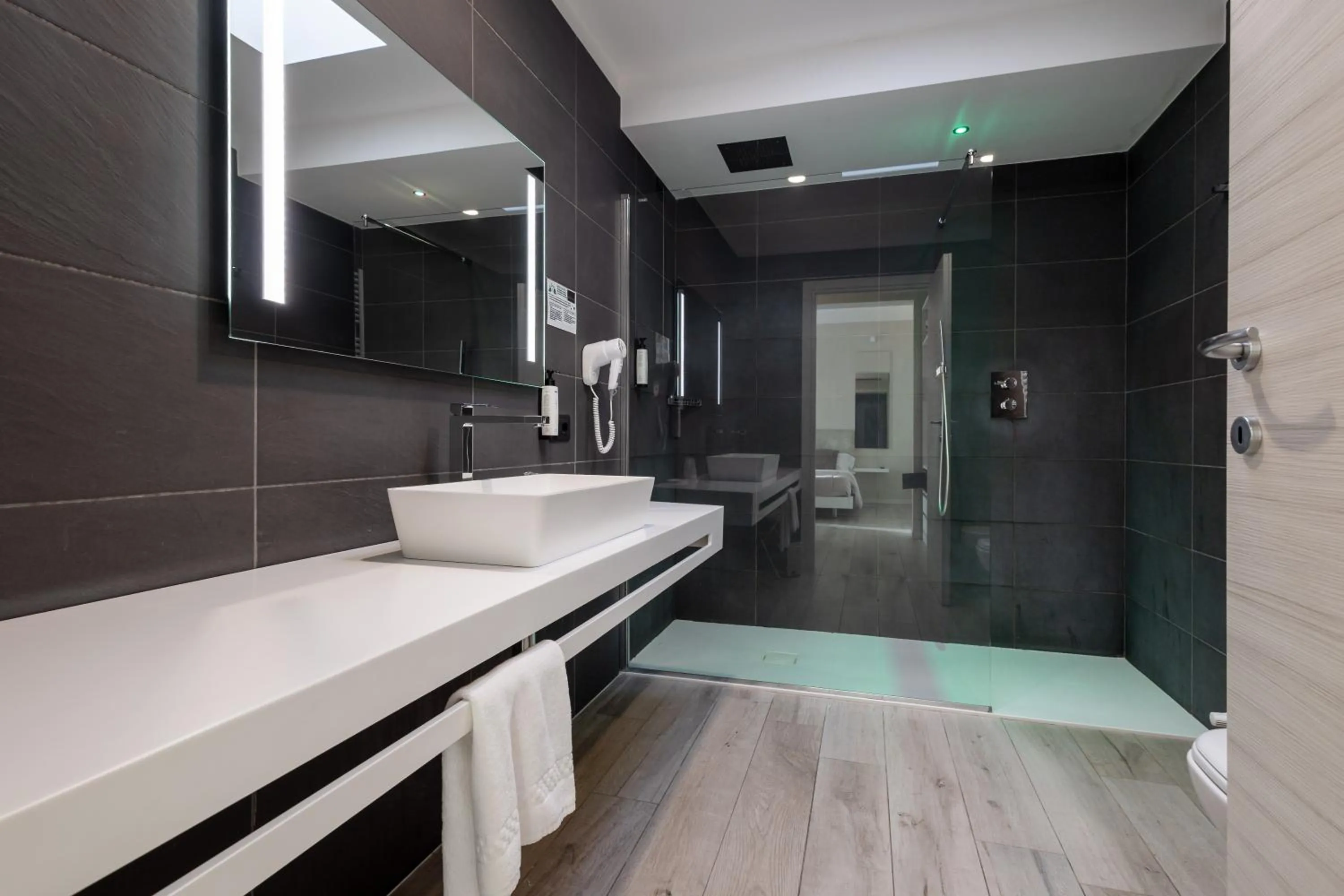 Bathroom in Aurora ApartHotel