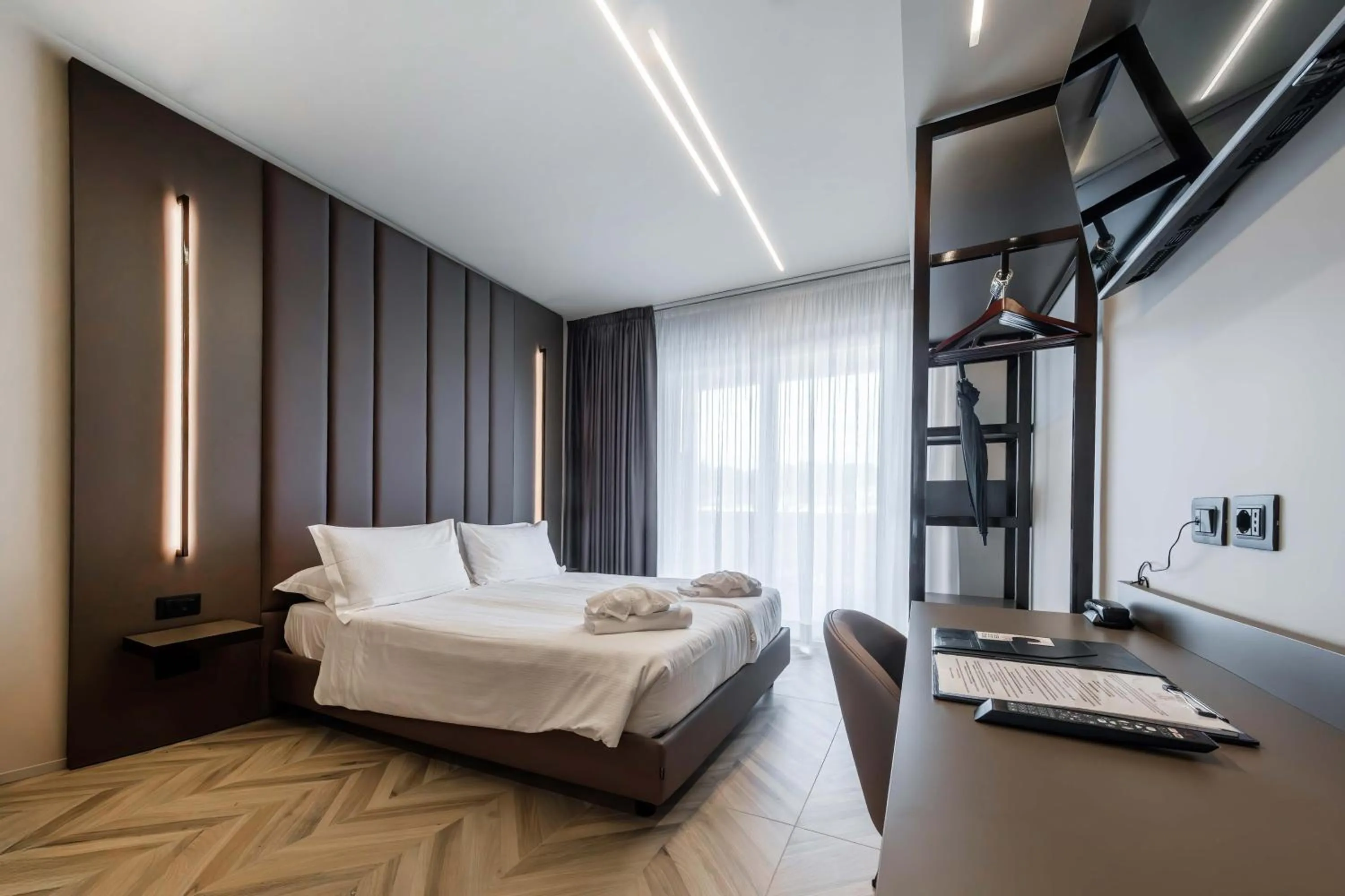 Bed in Aurora ApartHotel