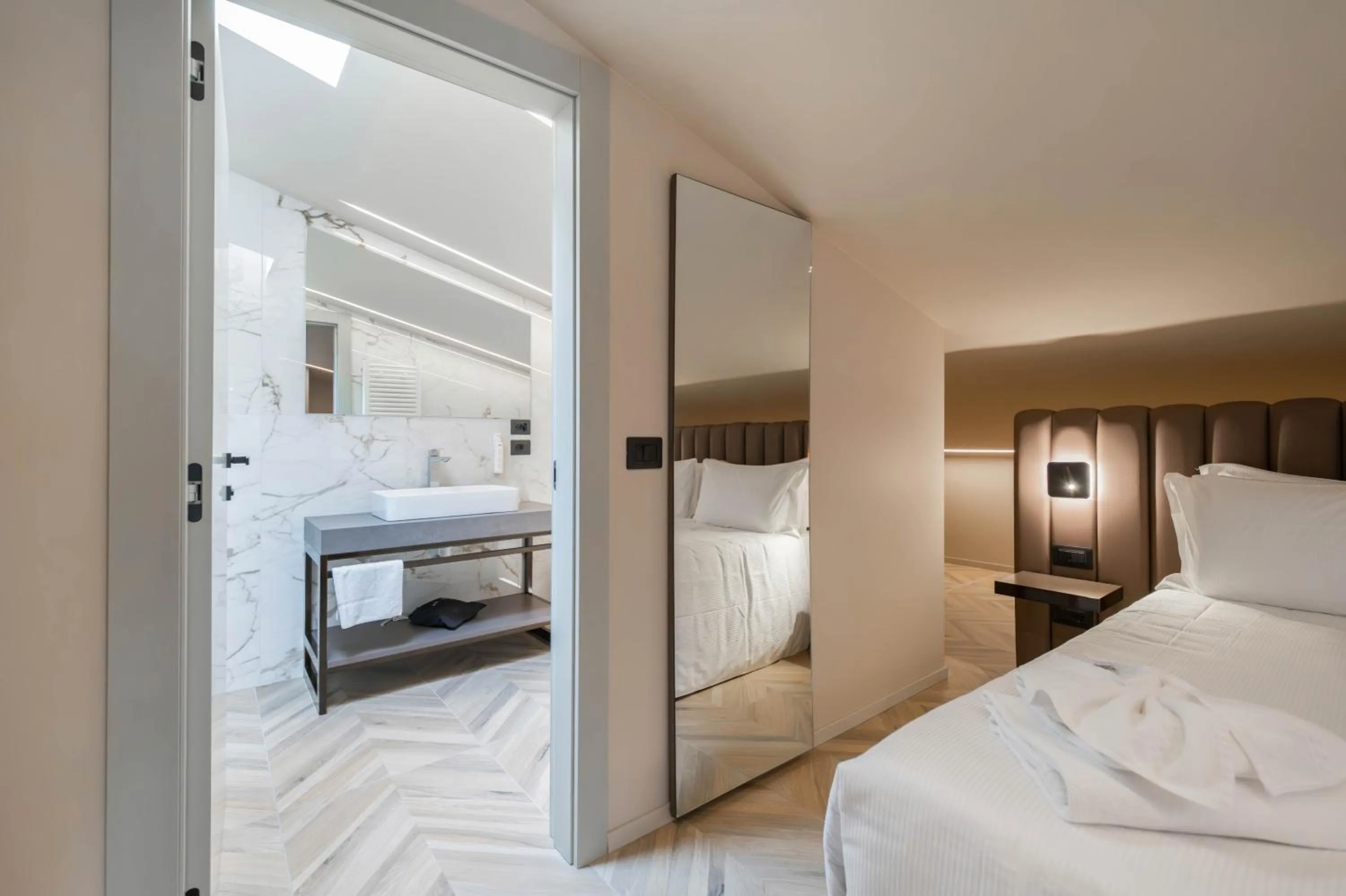 Bed in Aurora ApartHotel