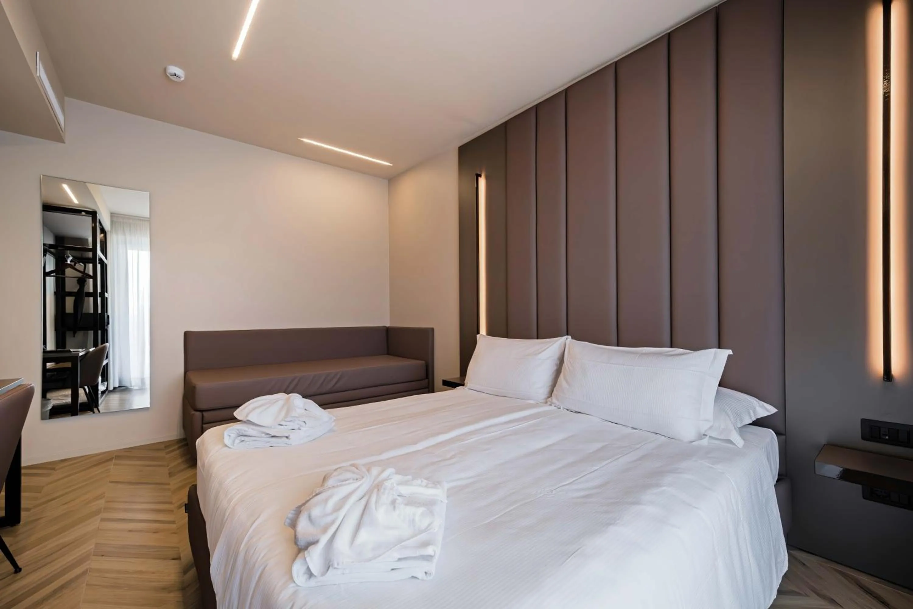 Bed in Aurora ApartHotel