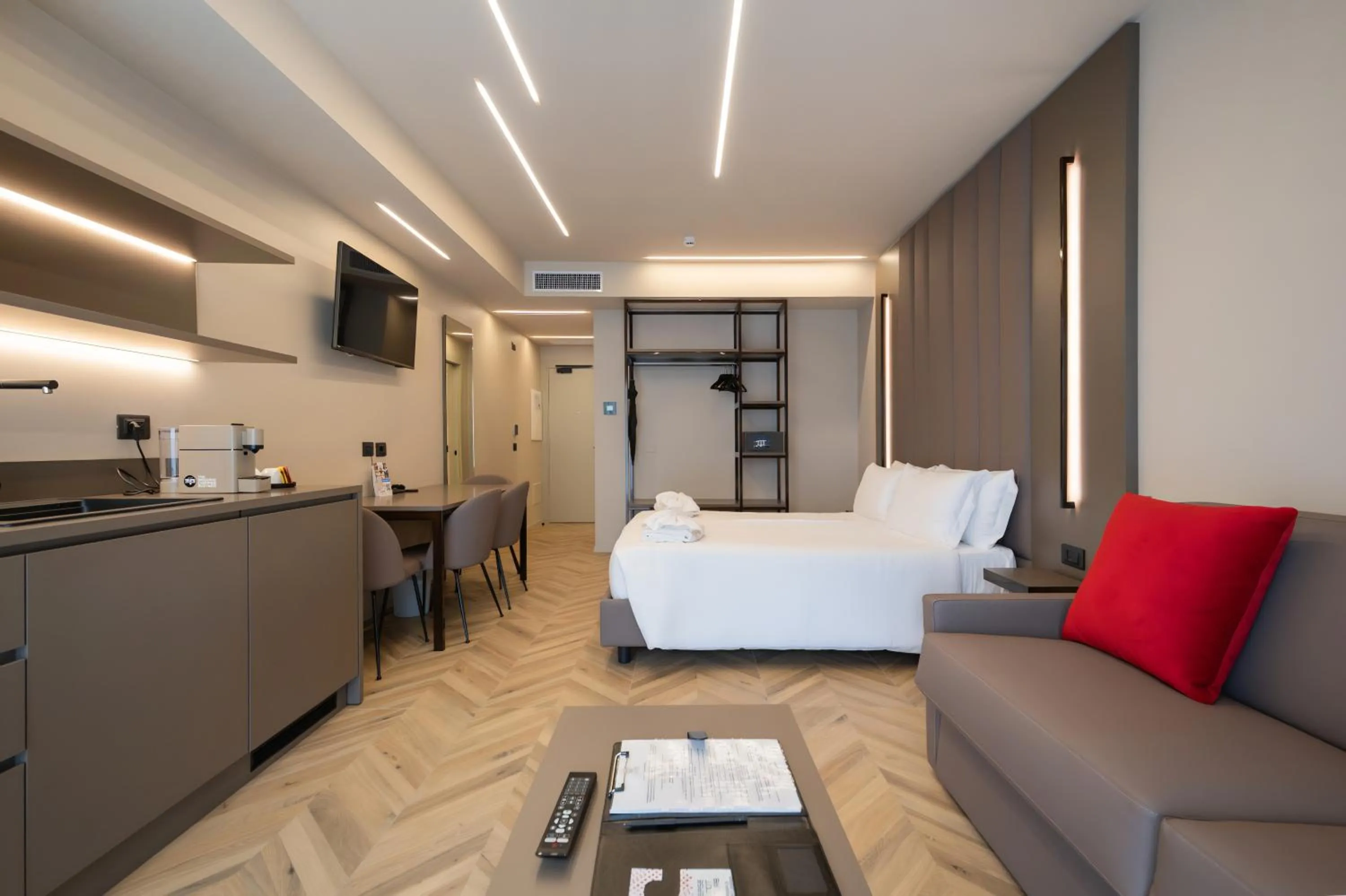 Bed in Aurora ApartHotel