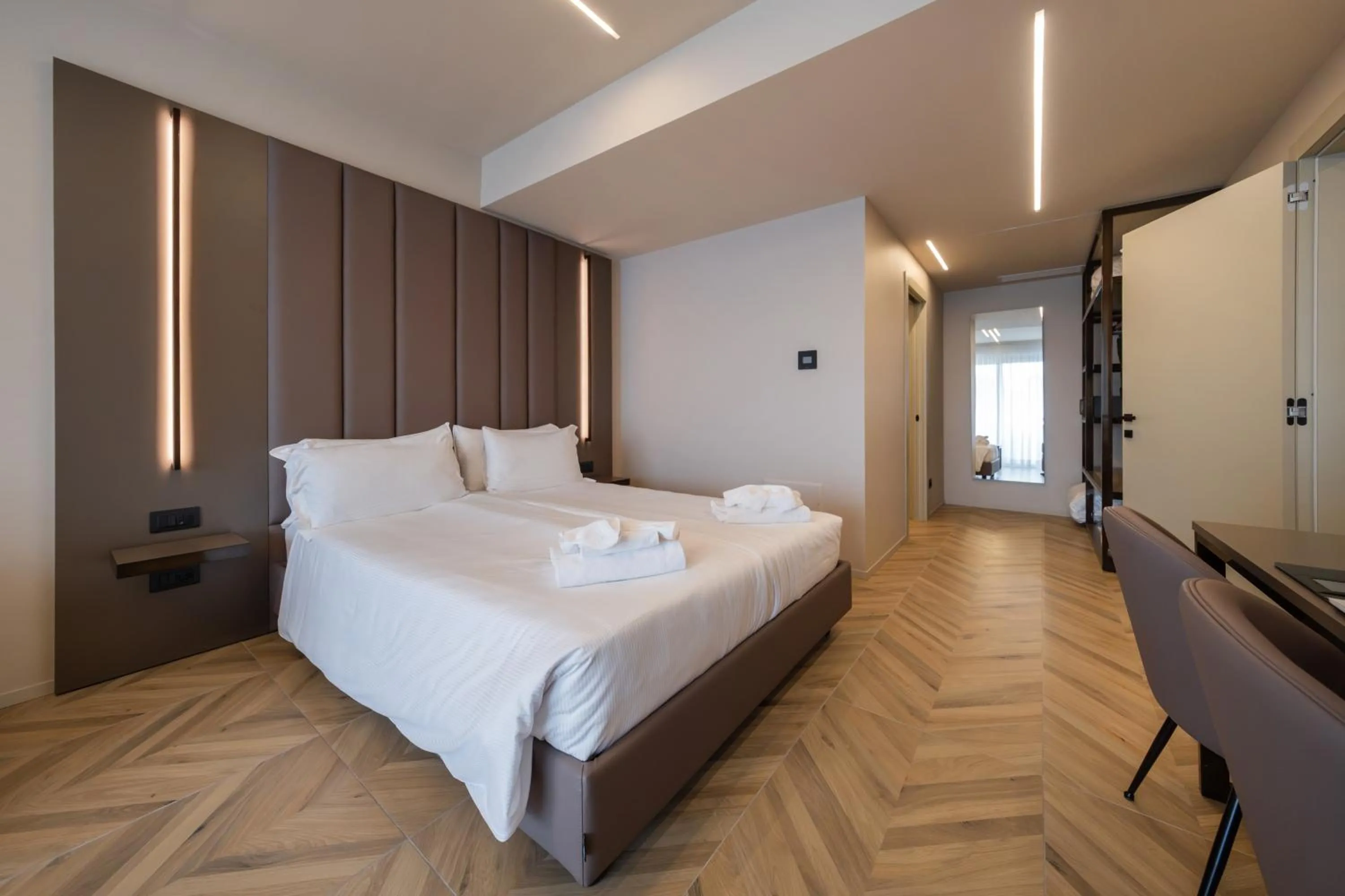 Bed in Aurora ApartHotel