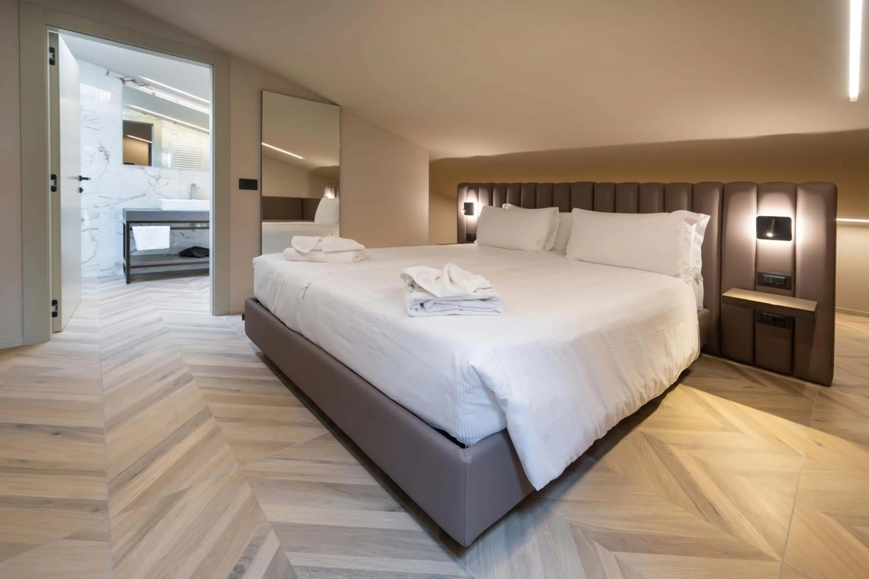 Bed in Aurora ApartHotel