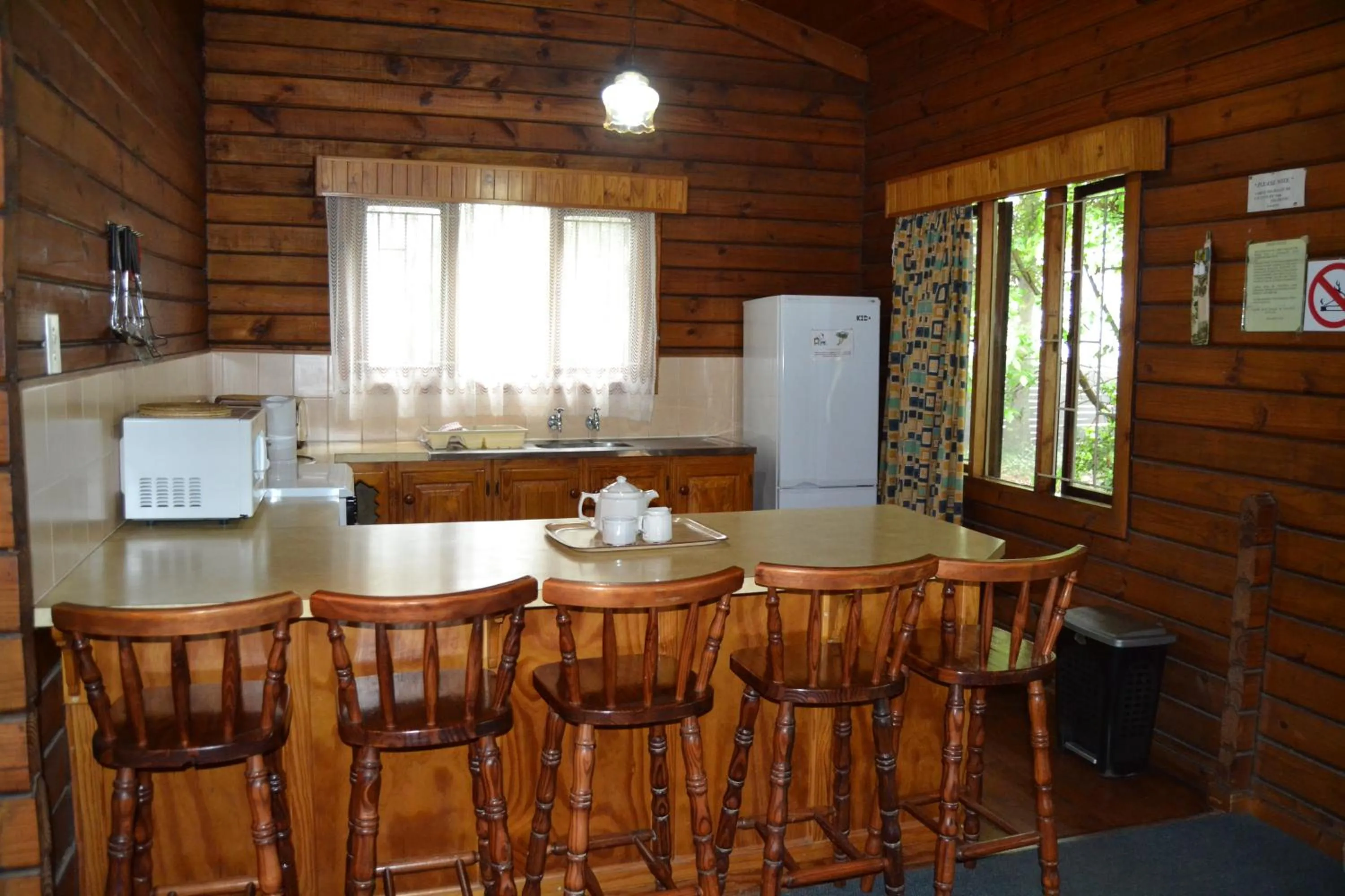 Kitchen or kitchenette in Log Cabin & Settlers Village