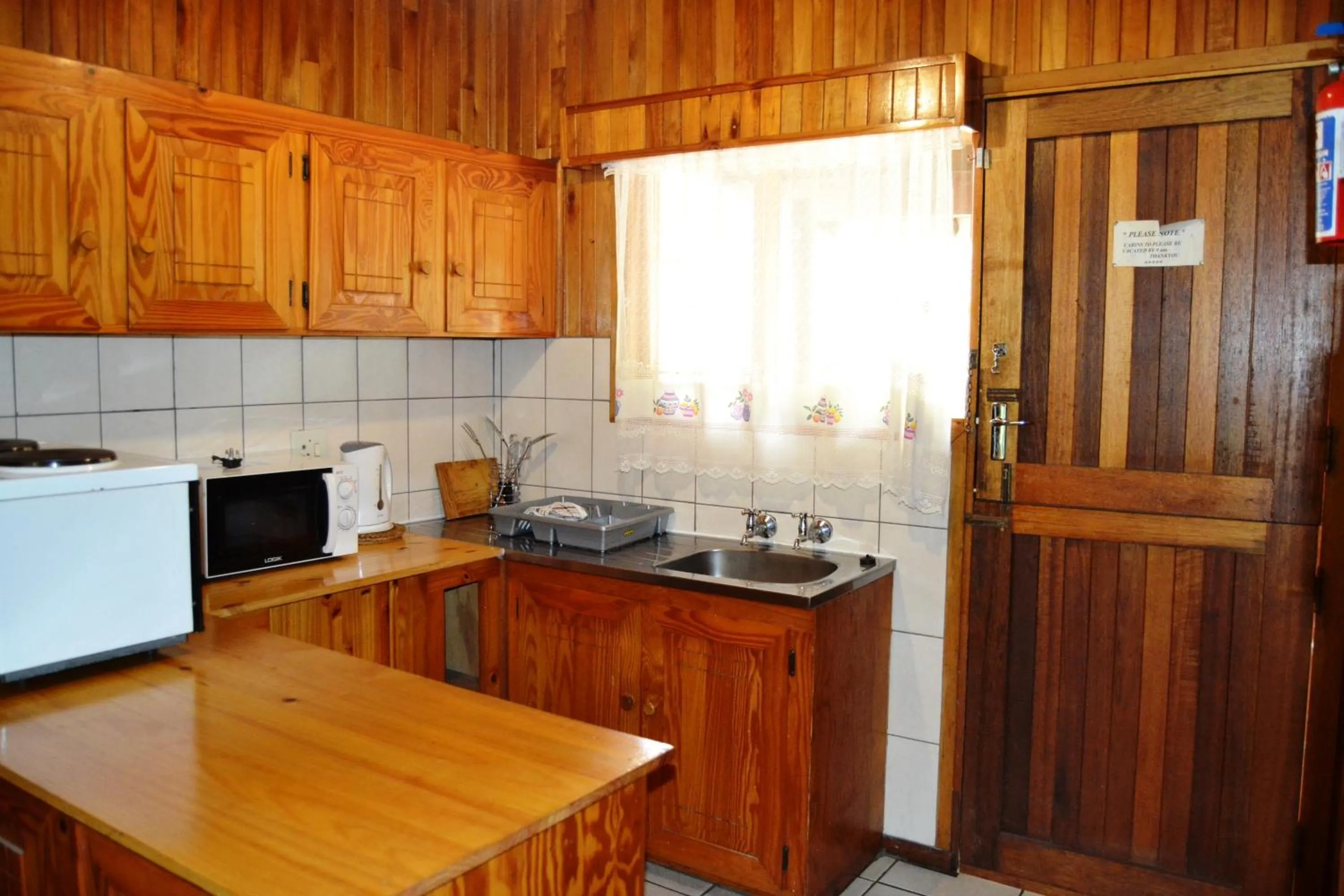 Kitchen or kitchenette in Log Cabin & Settlers Village