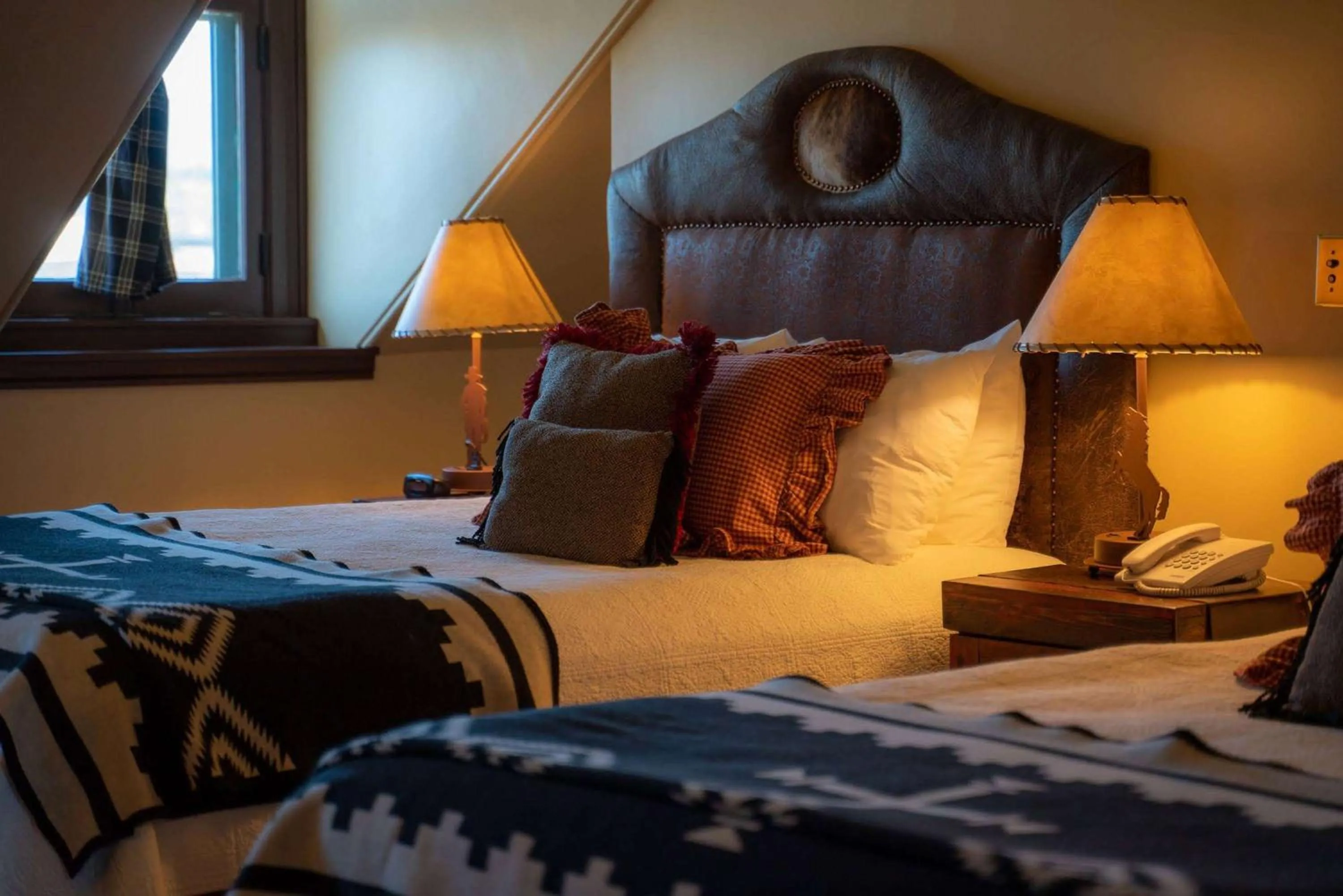 Bedroom, Bed in Sheridan Inn - Best Western Signature Collection