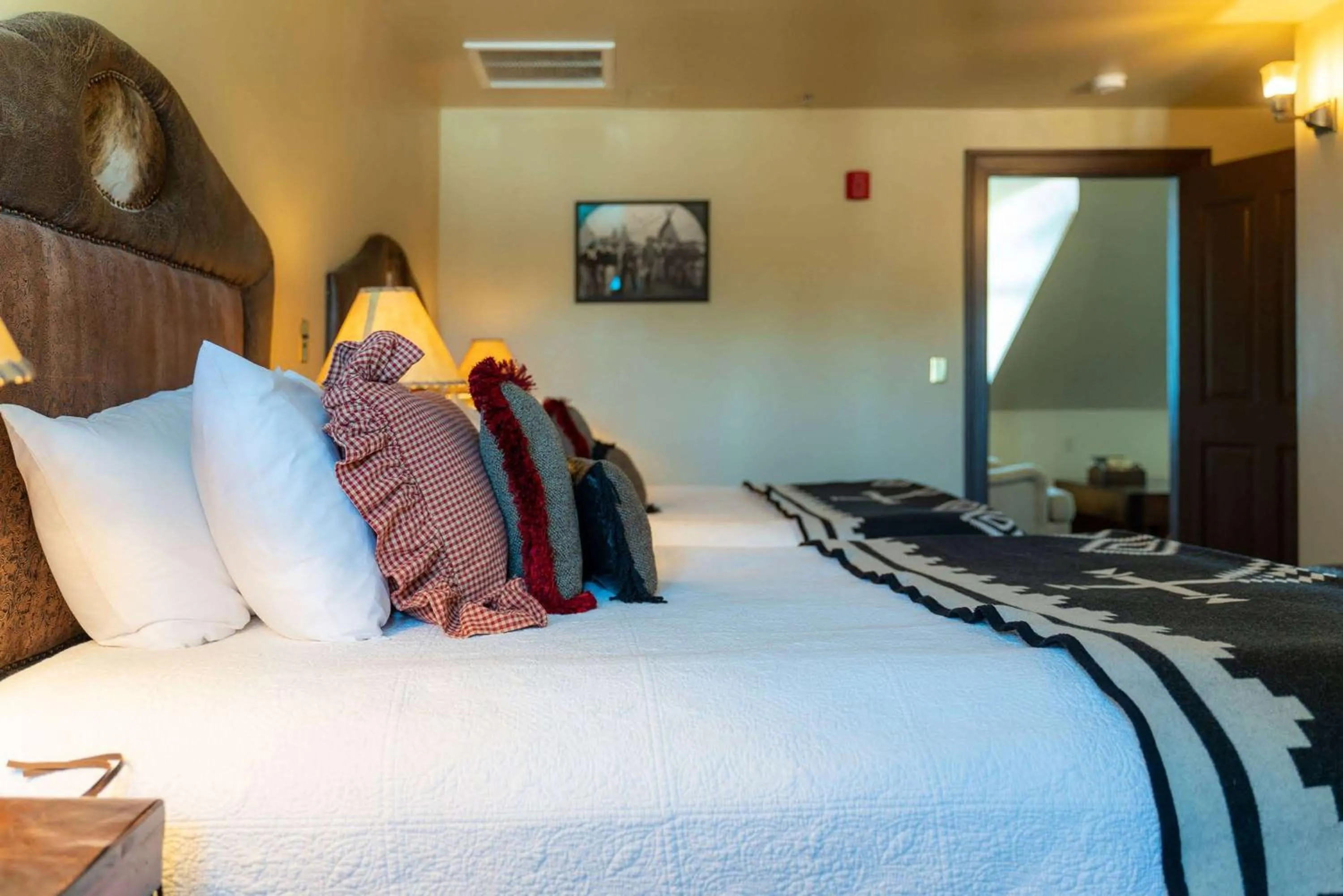 Bedroom, Bed in Sheridan Inn - Best Western Signature Collection