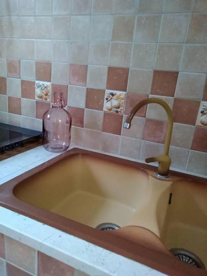 Communal kitchen in Trulli Villa Gloria