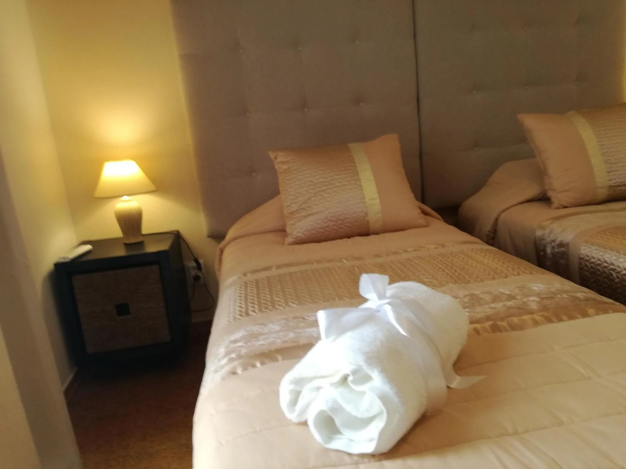 Bed in Sensations Guesthouse