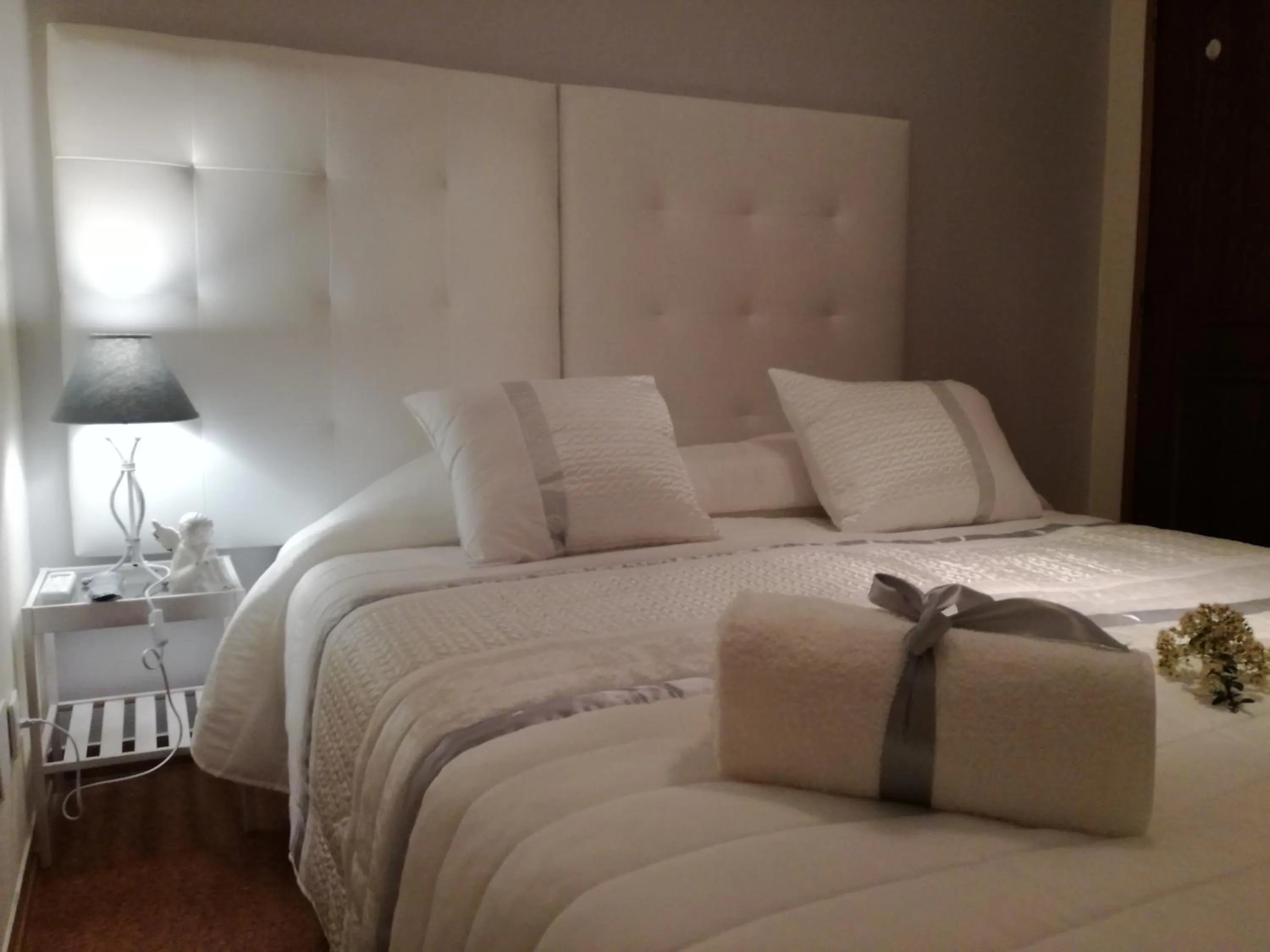 Bed in Sensations Guesthouse