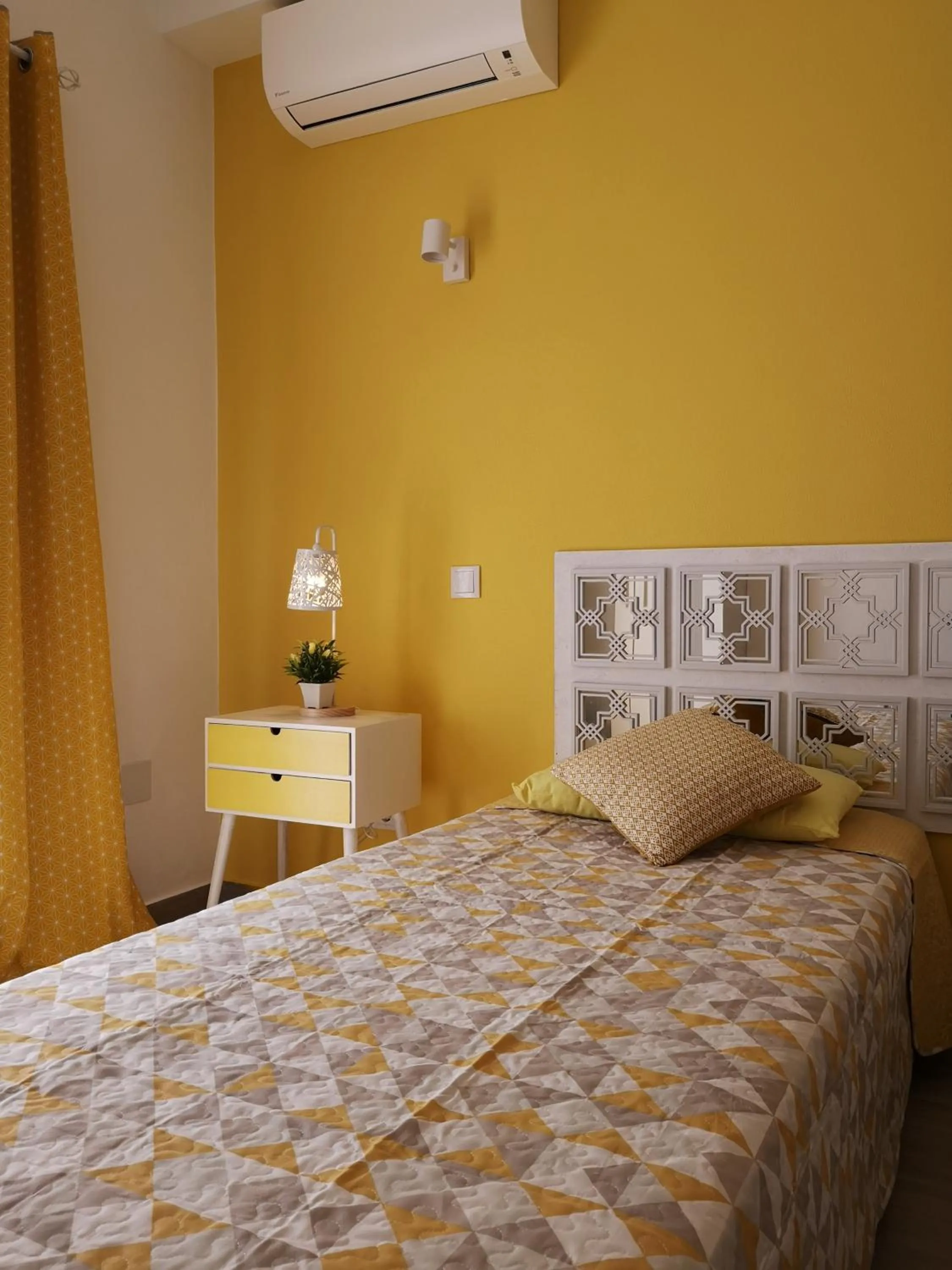 Bed in Sensations Guesthouse