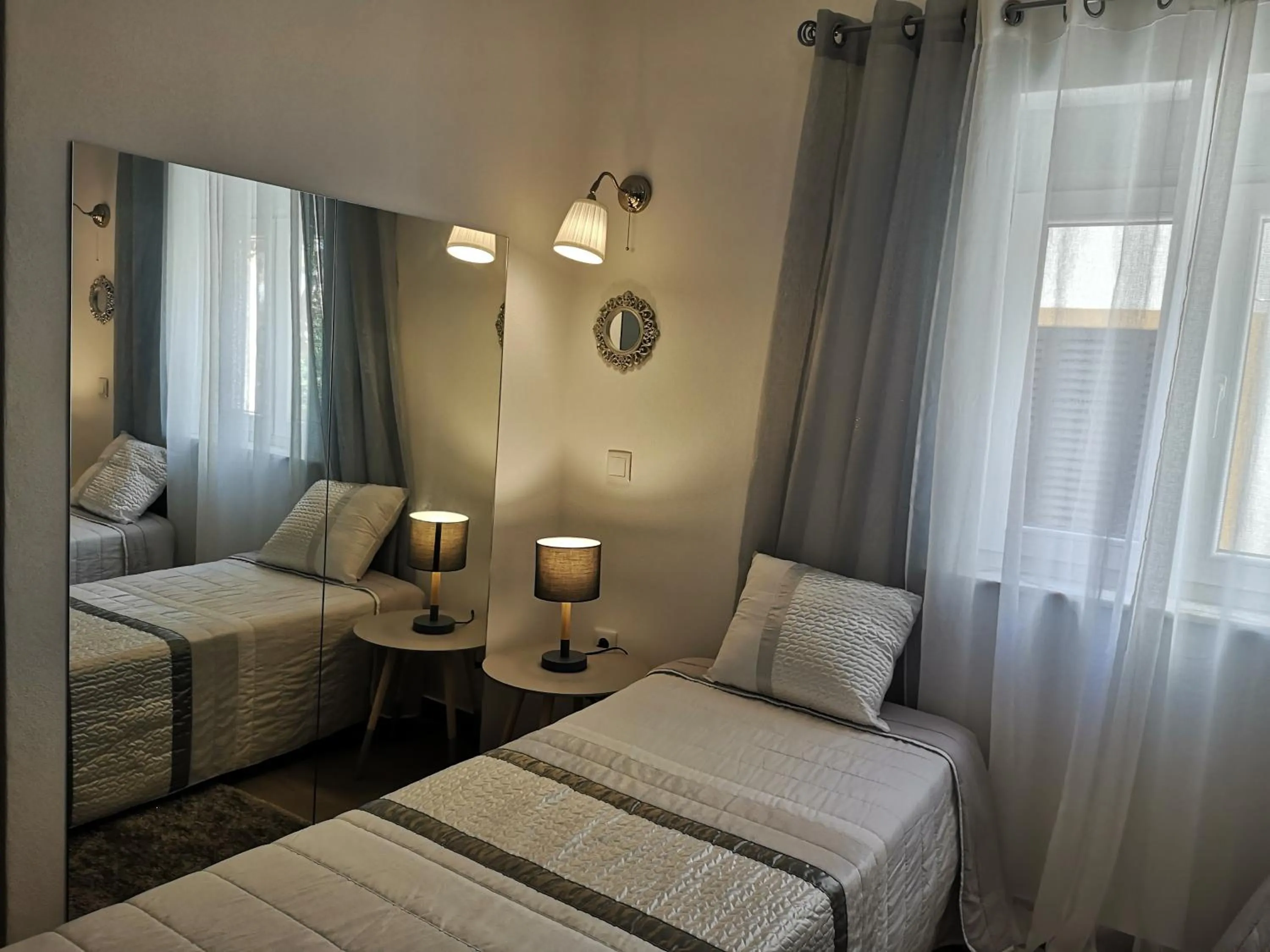 Bed in Sensations Guesthouse