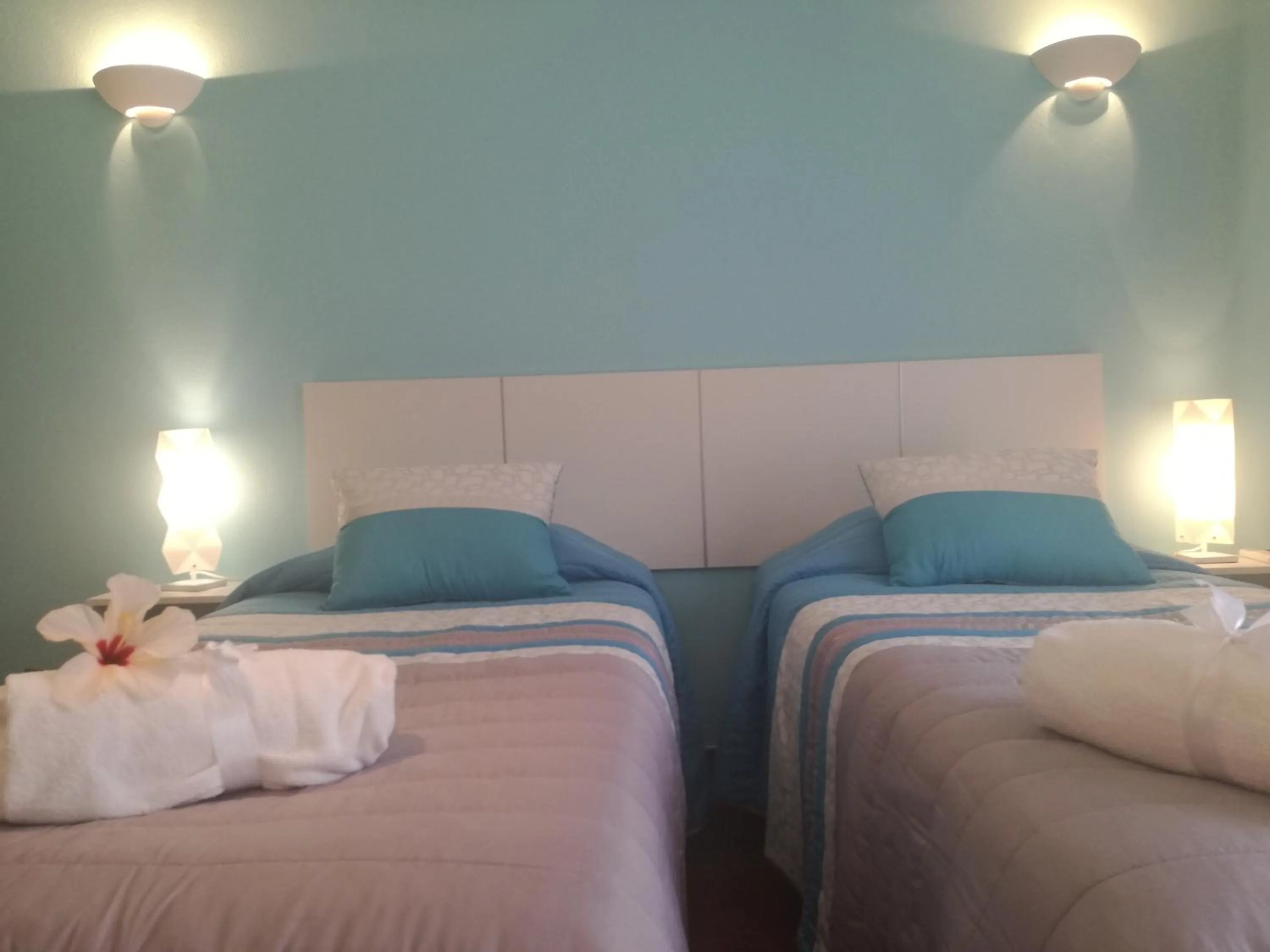 Bed in Sensations Guesthouse