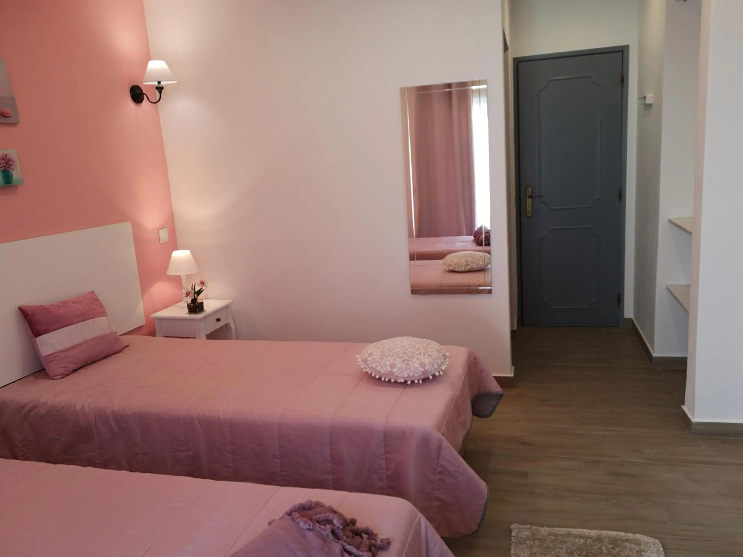 Bed in Sensations Guesthouse