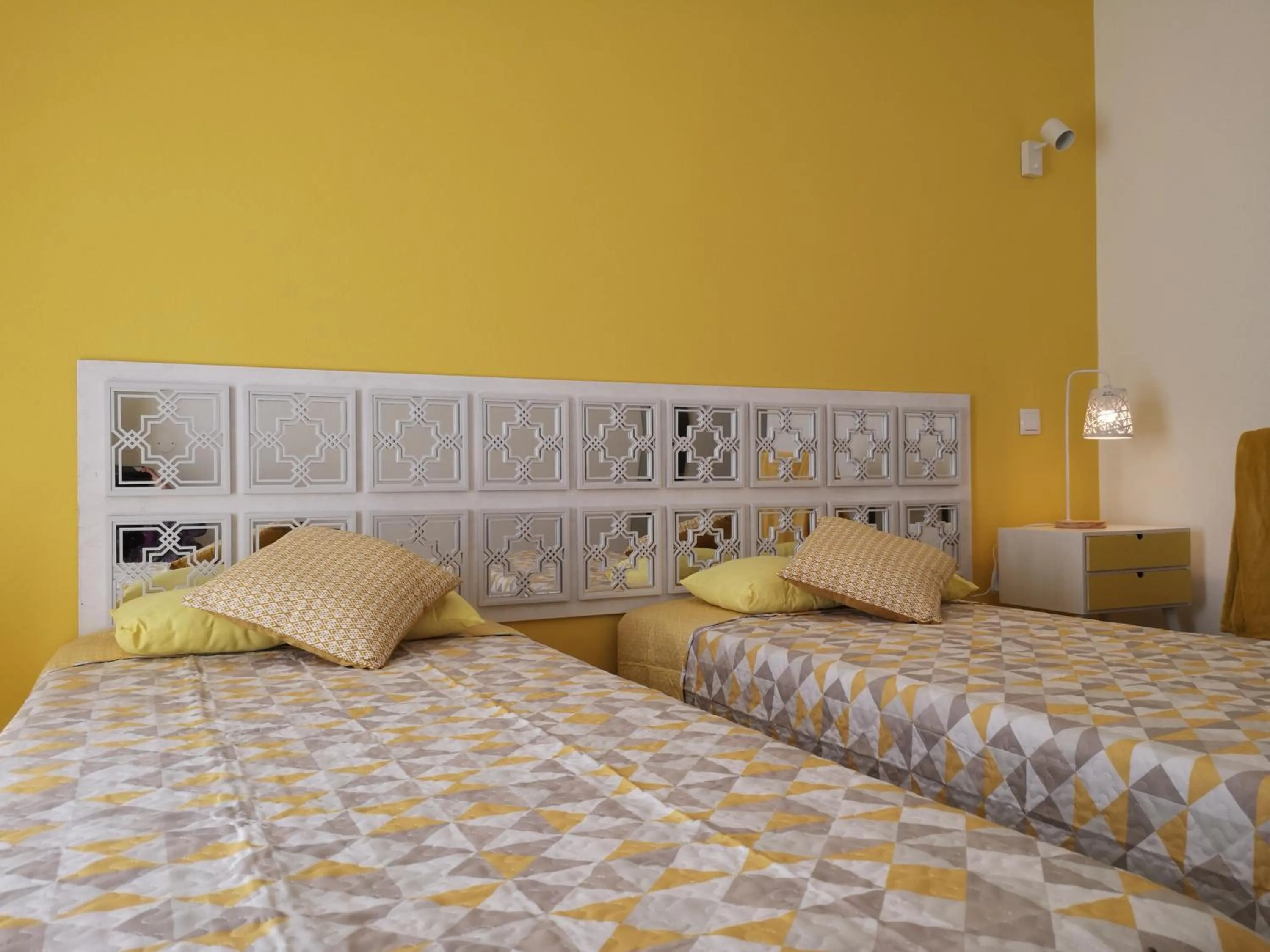 Bed in Sensations Guesthouse