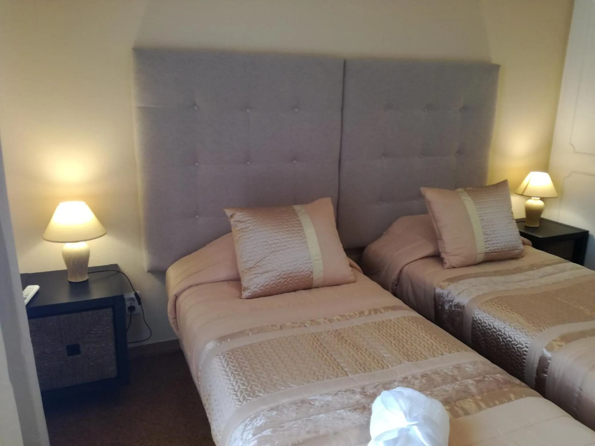 Bed in Sensations Guesthouse