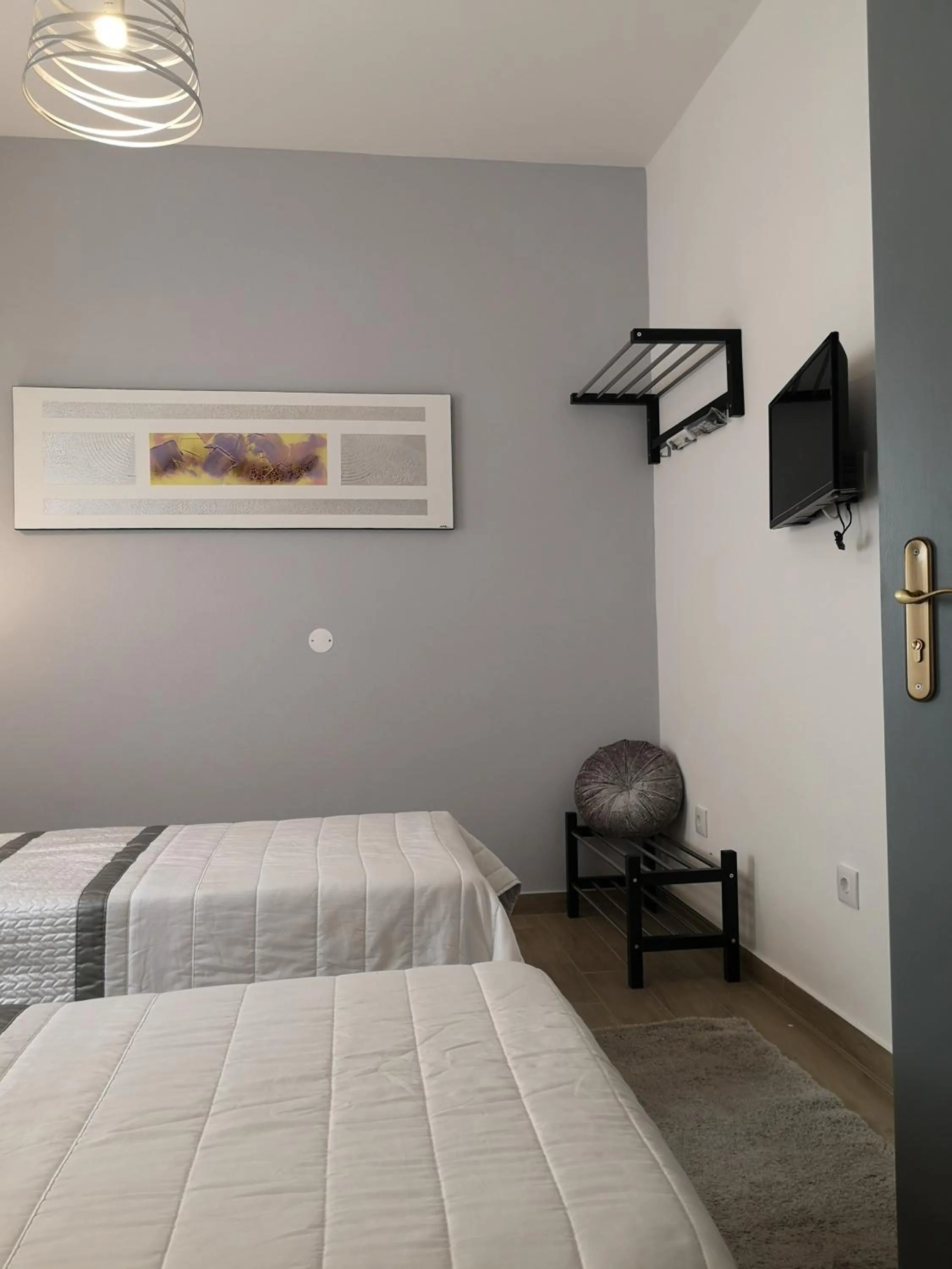 Bed in Sensations Guesthouse