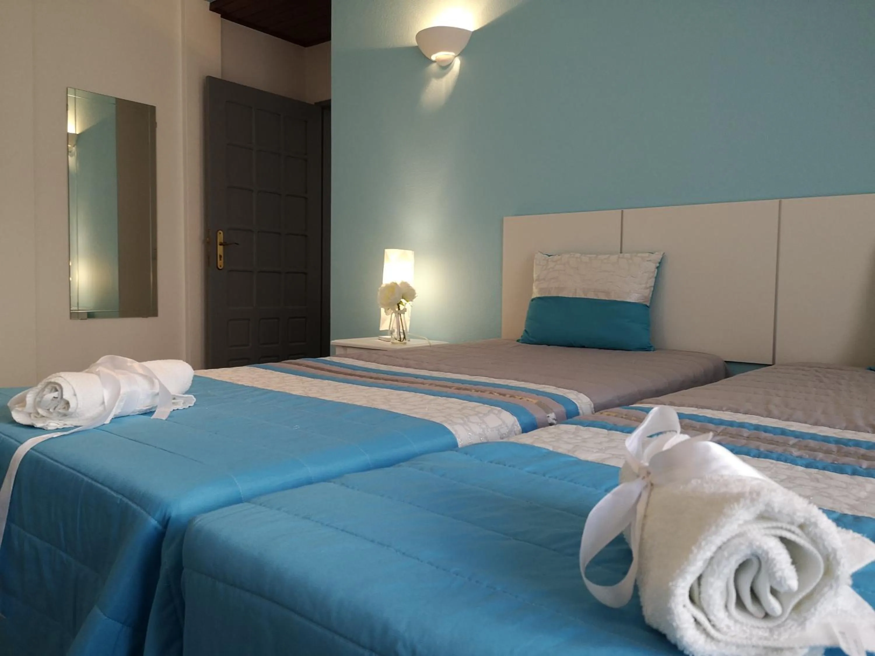 Bed in Sensations Guesthouse