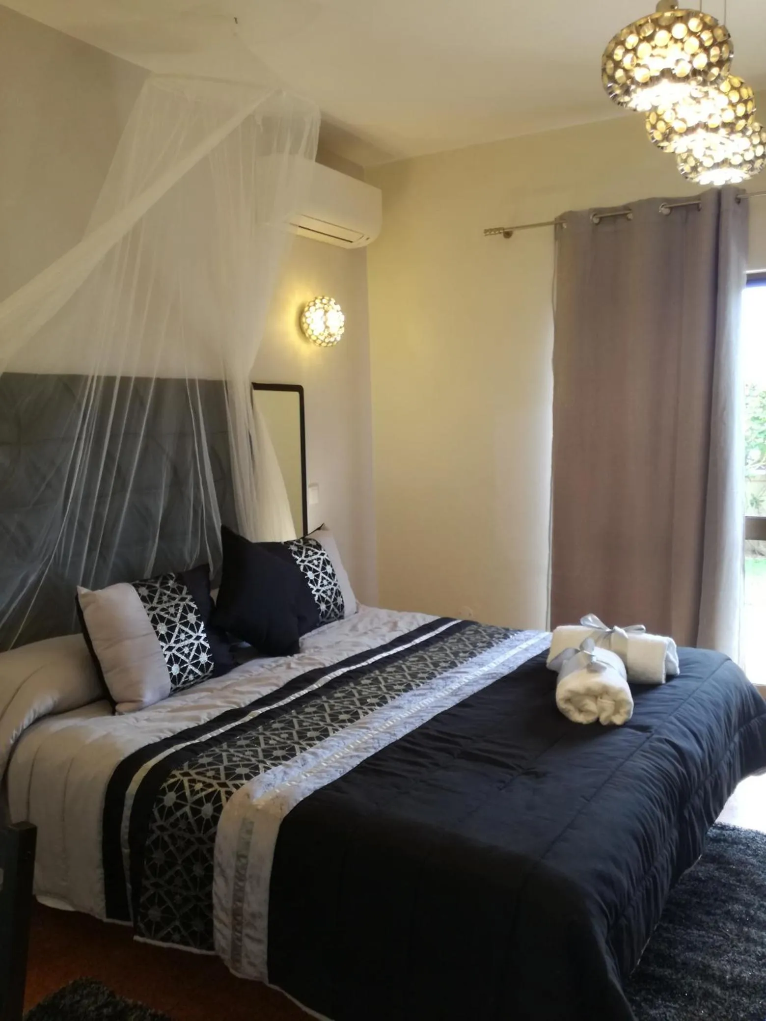 Bed in Sensations Guesthouse