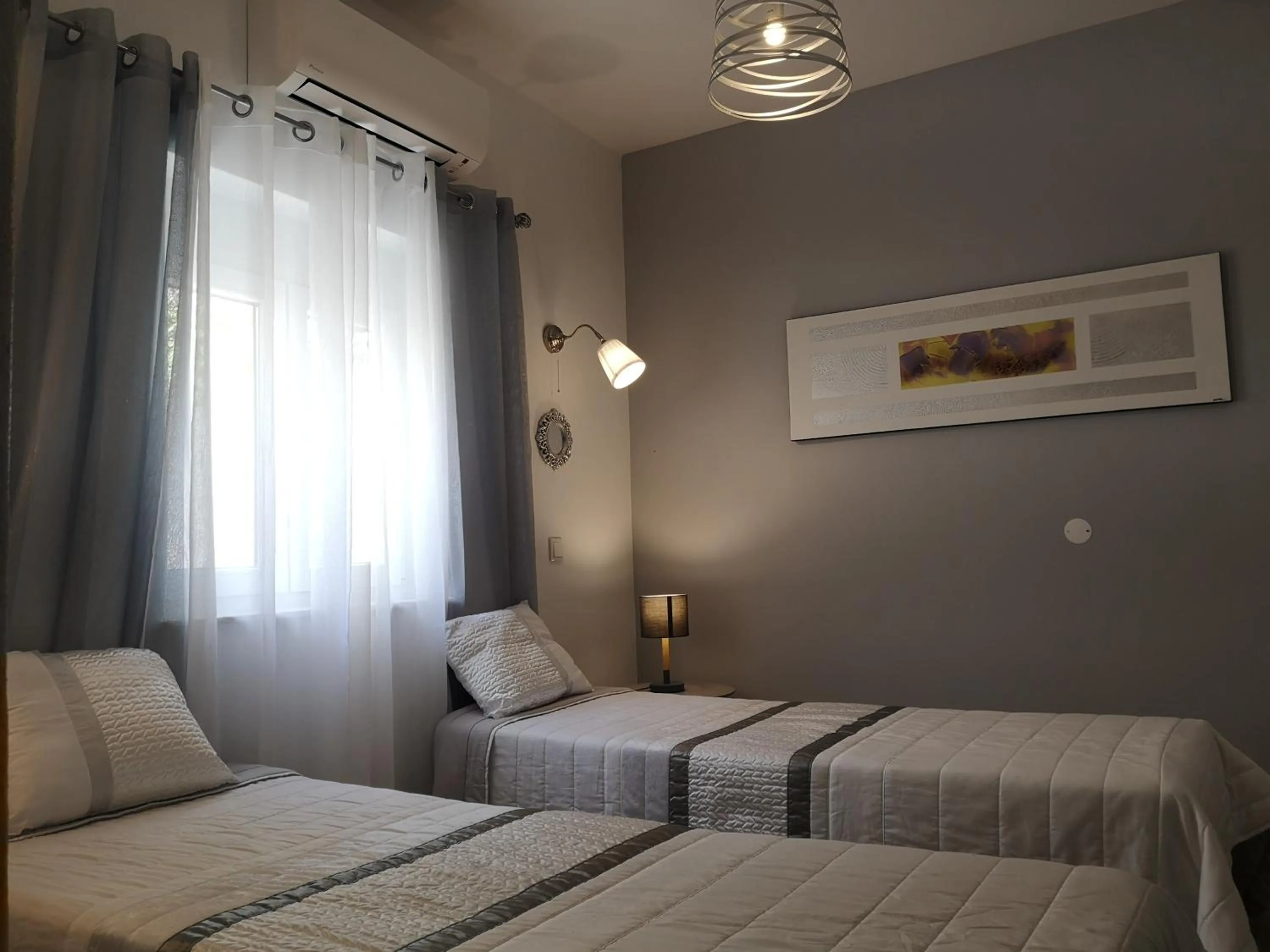 Bed in Sensations Guesthouse