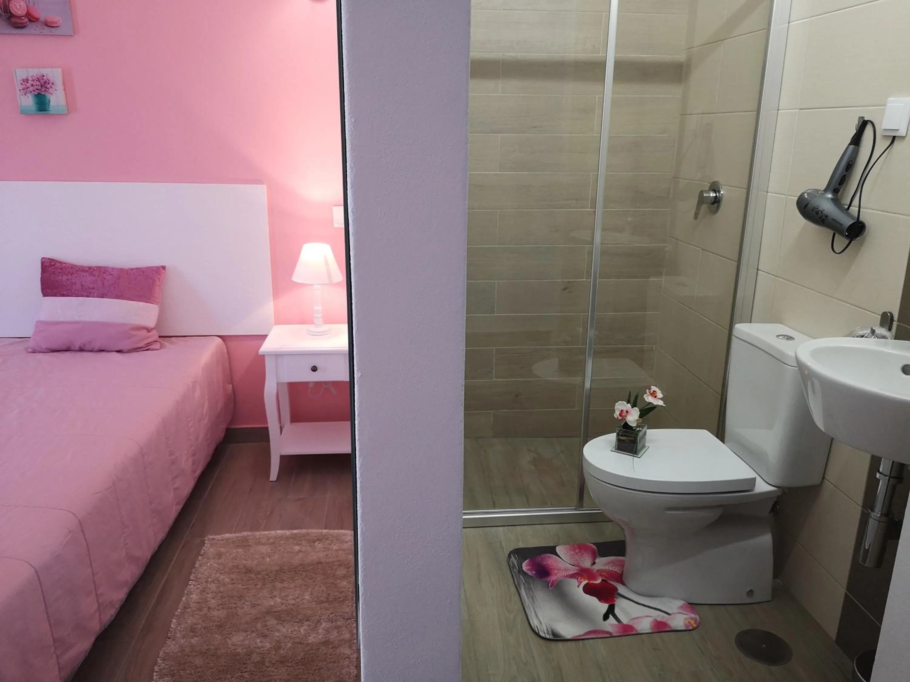 Bed in Sensations Guesthouse