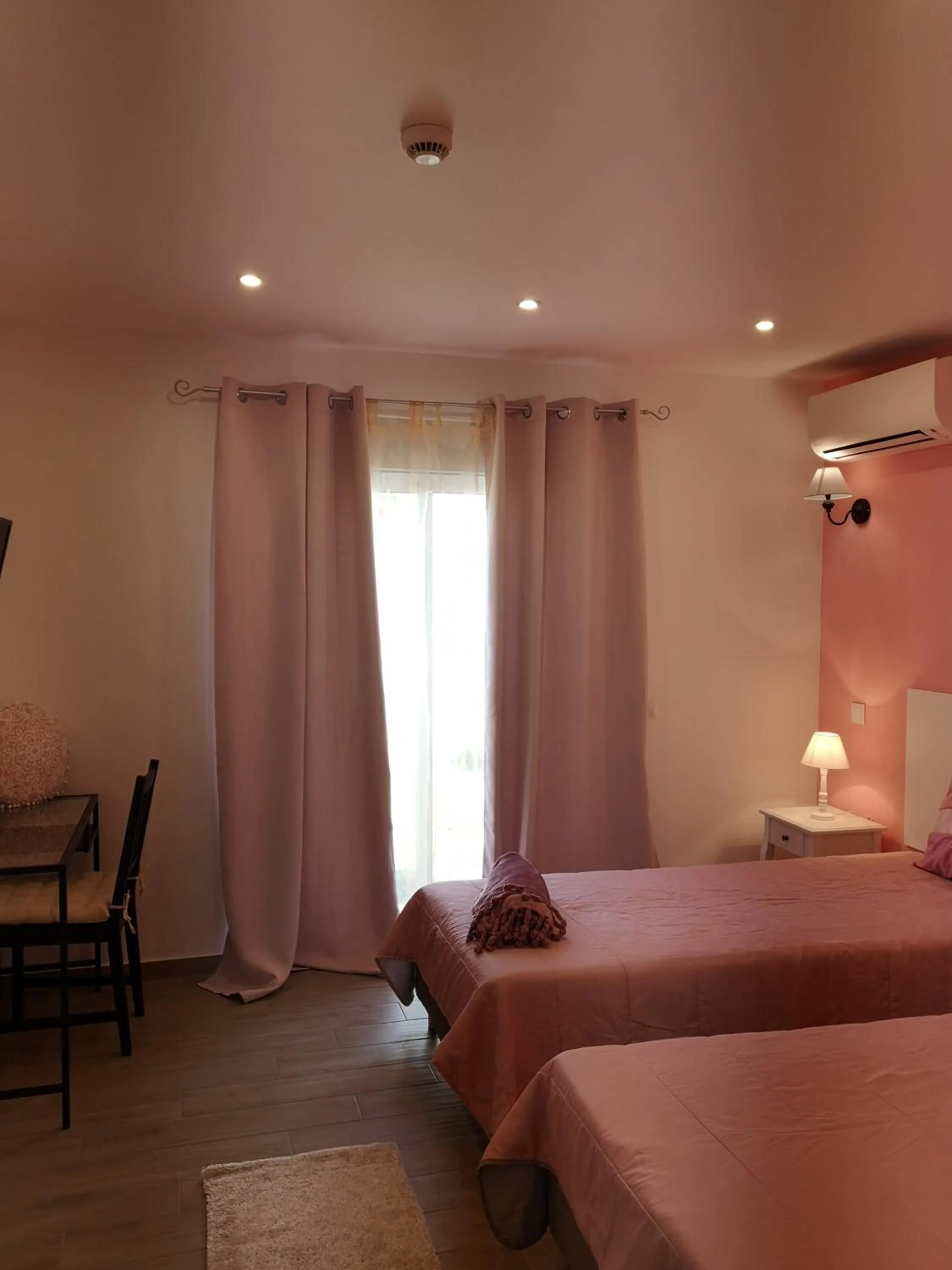 Bed in Sensations Guesthouse