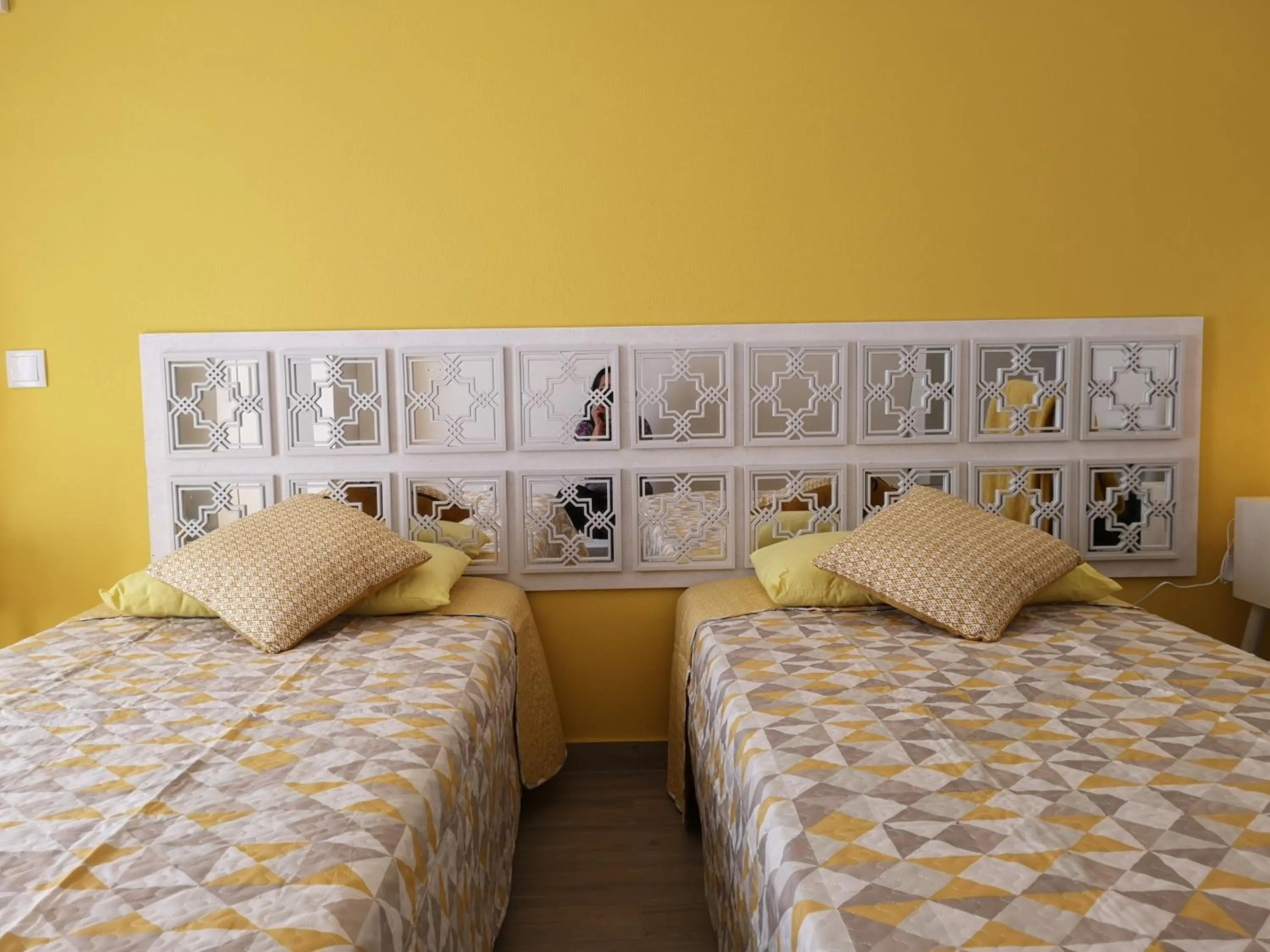 Bed in Sensations Guesthouse