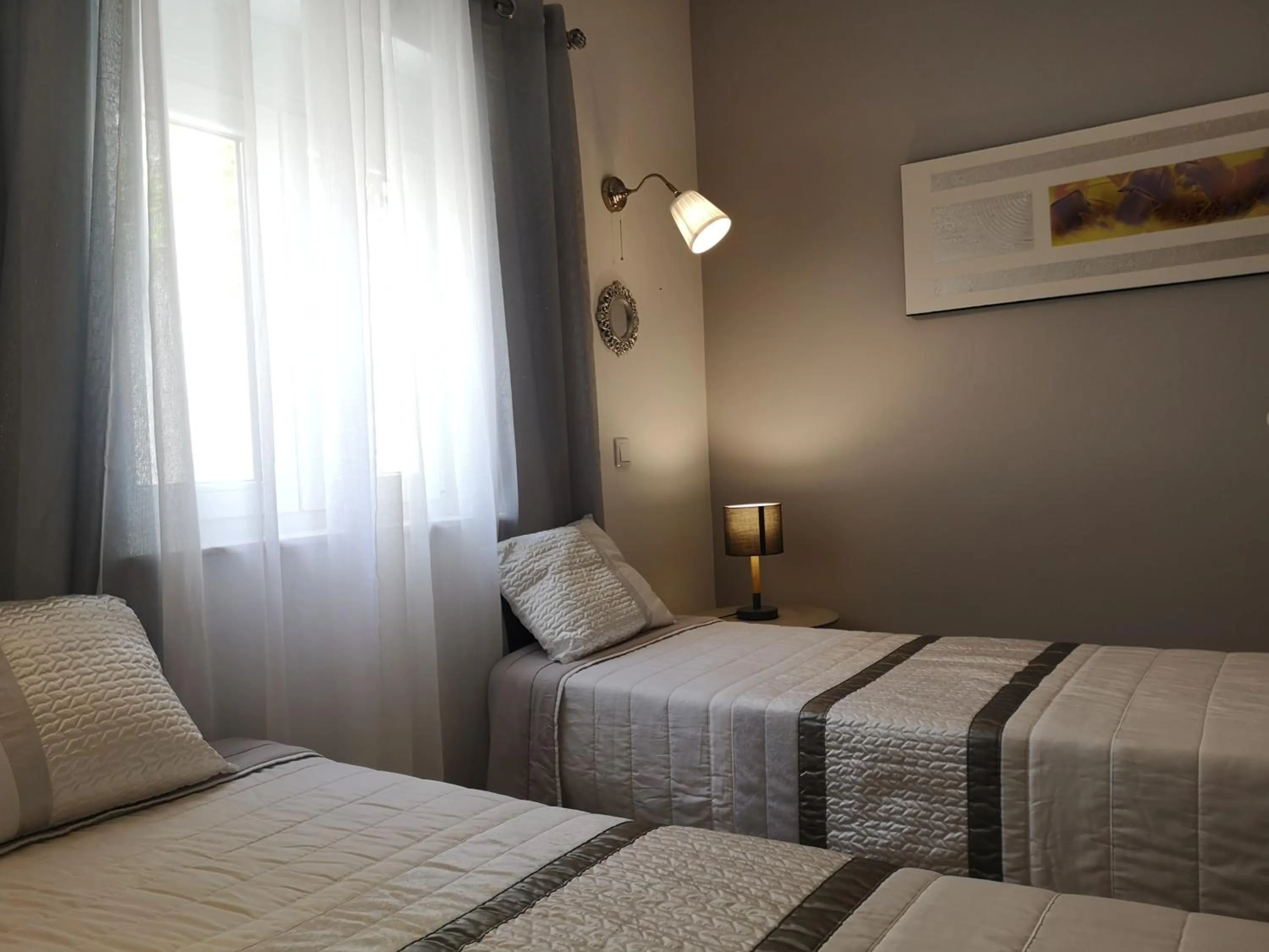 Bed in Sensations Guesthouse