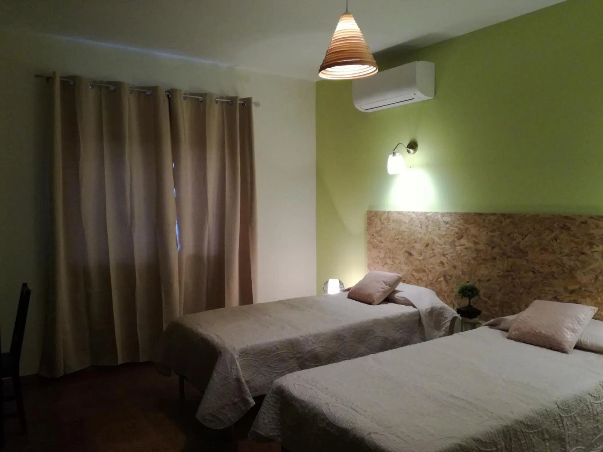 Bed in Sensations Guesthouse