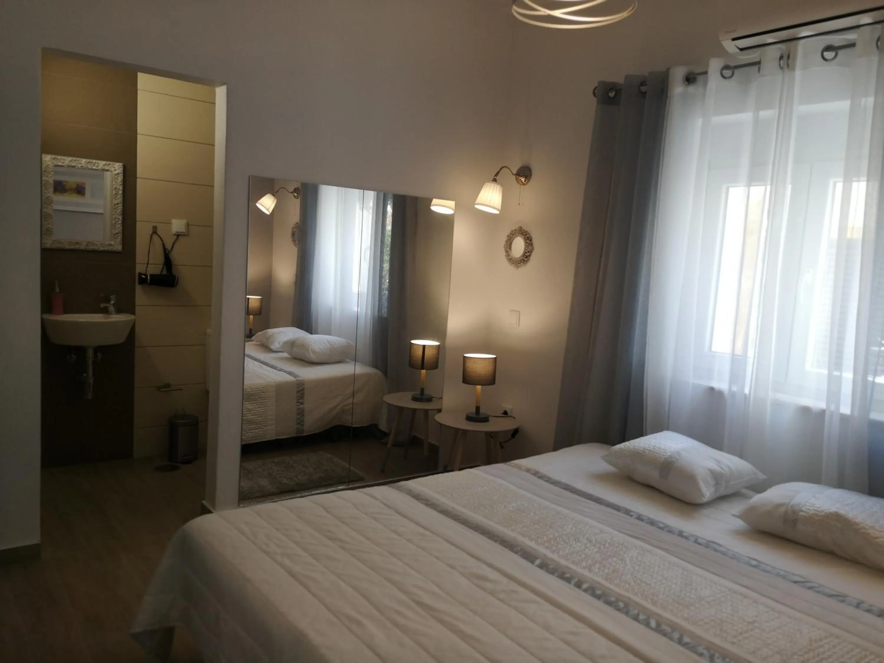 Bed in Sensations Guesthouse