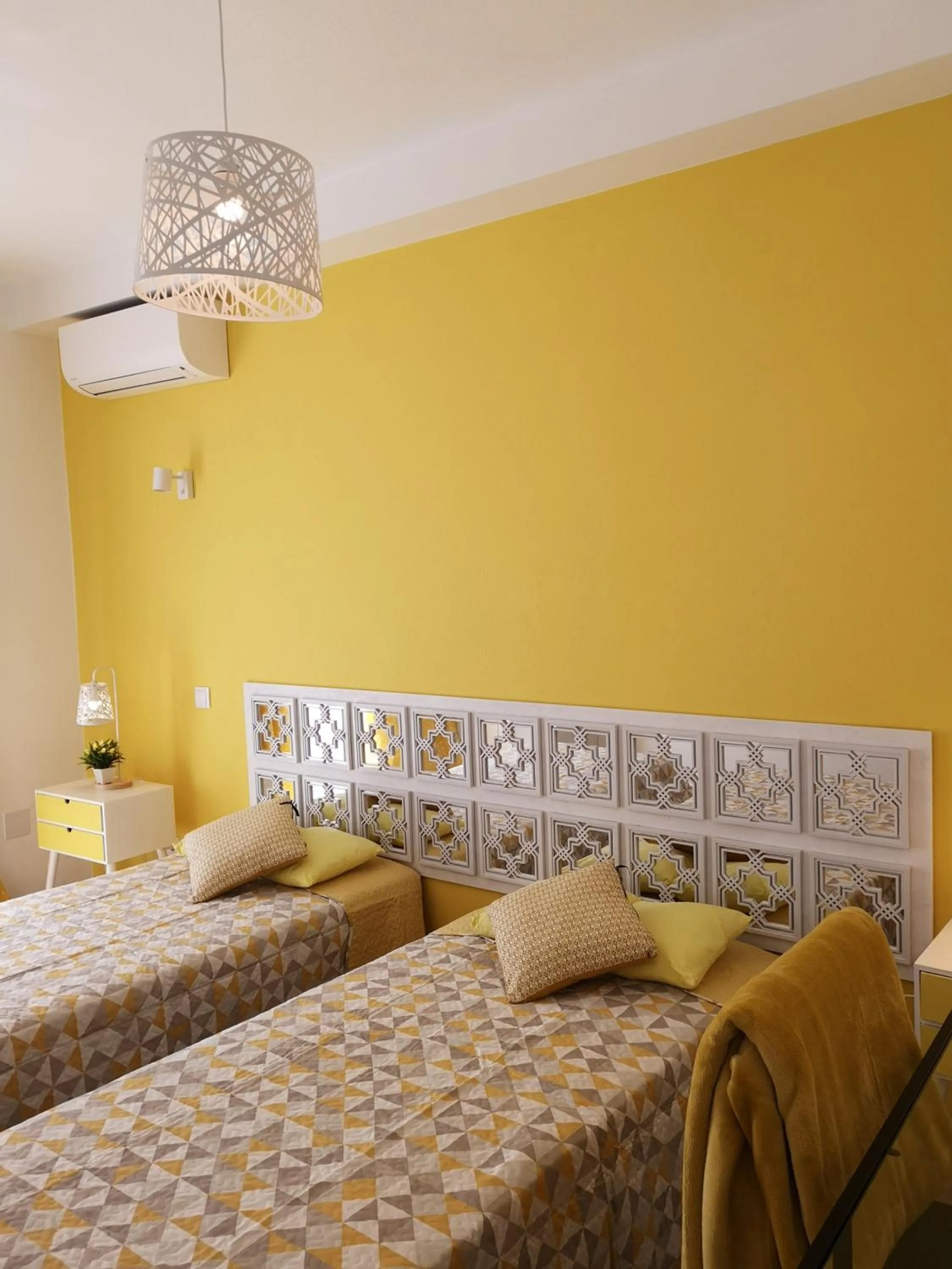 Bed in Sensations Guesthouse