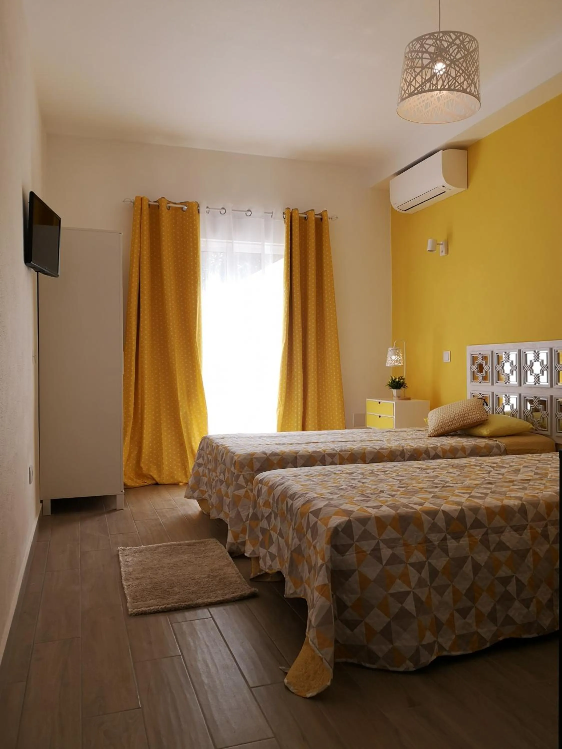 Bed in Sensations Guesthouse