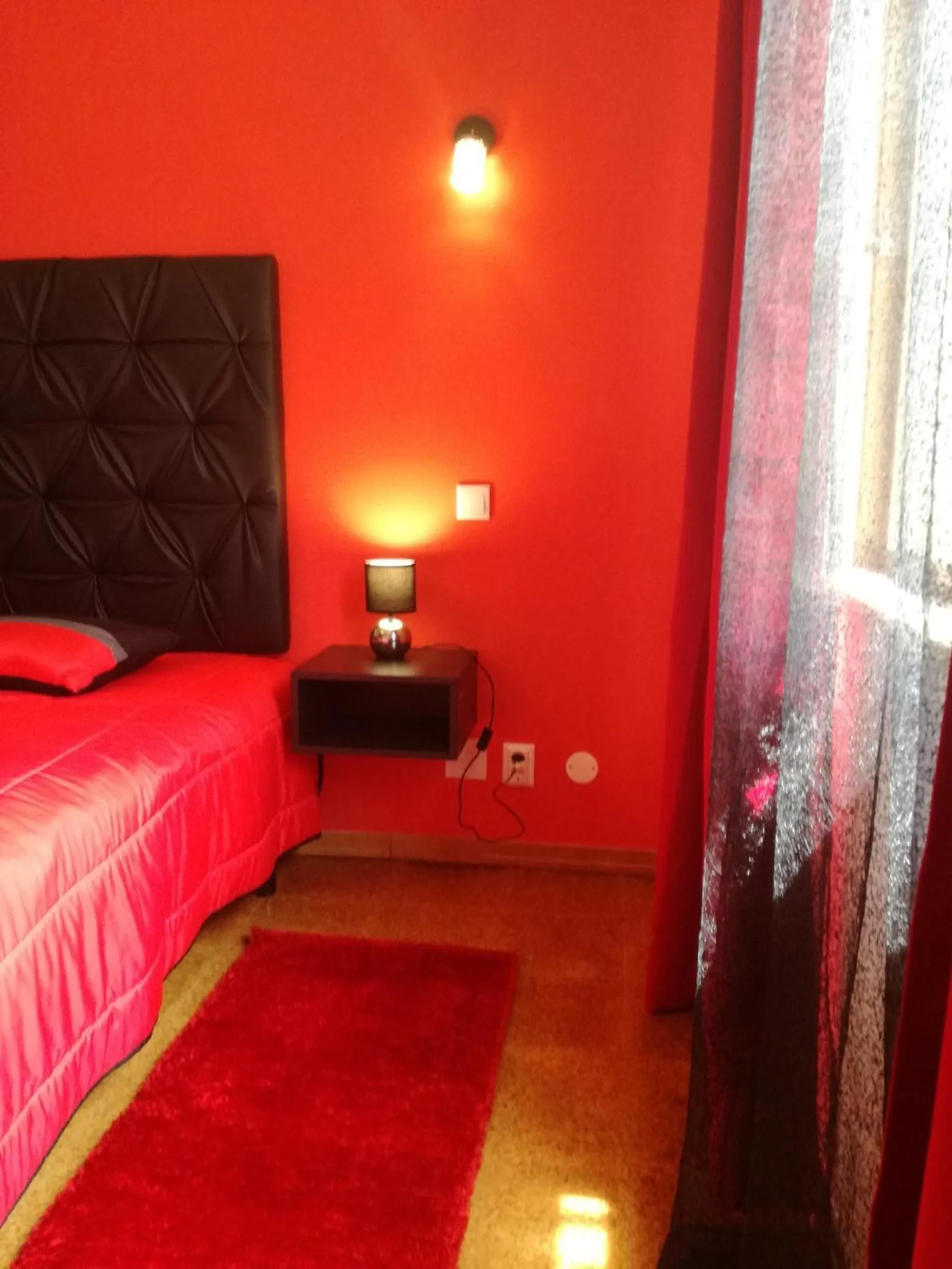 Bed in Sensations Guesthouse