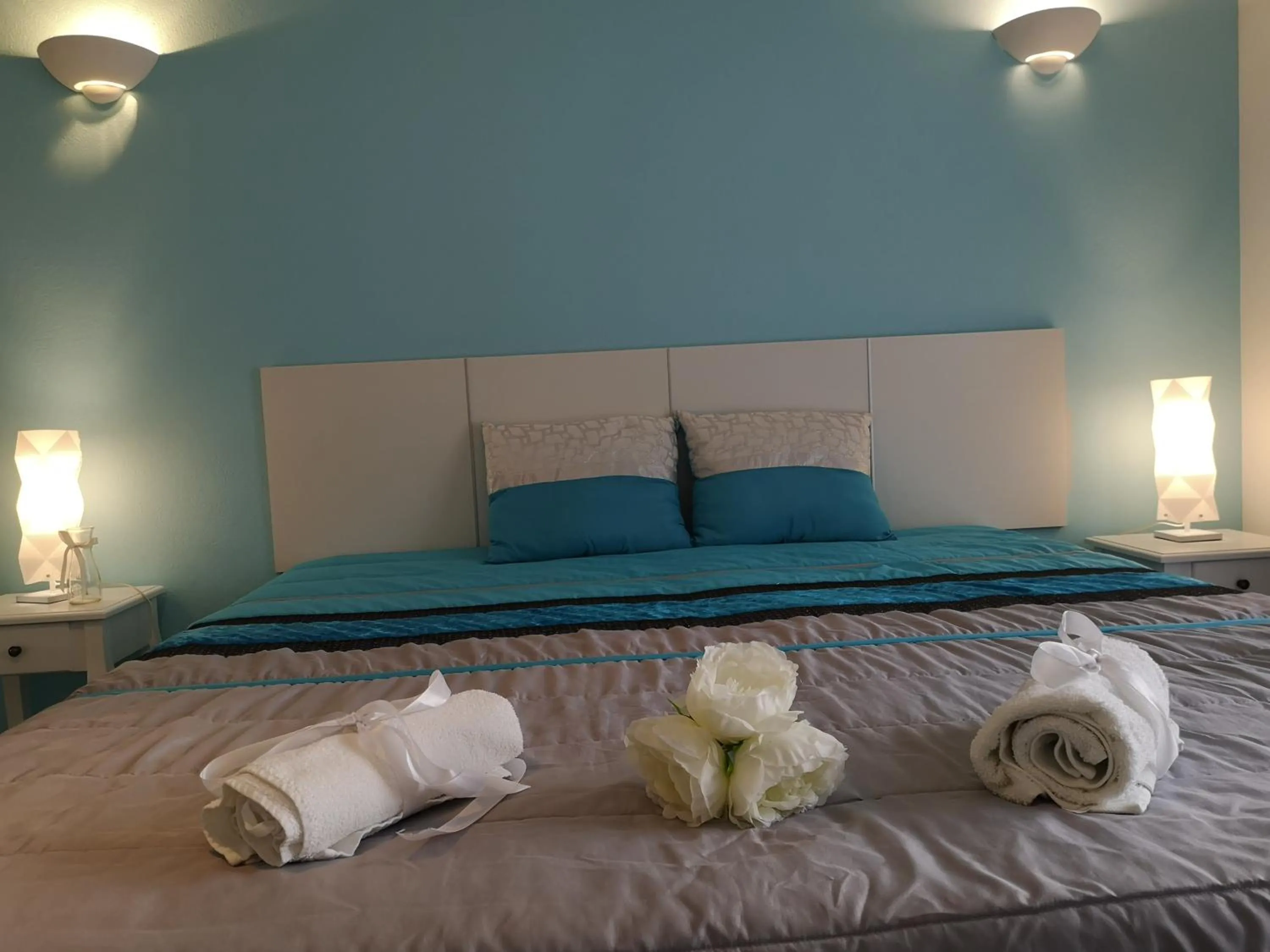 Bed in Sensations Guesthouse