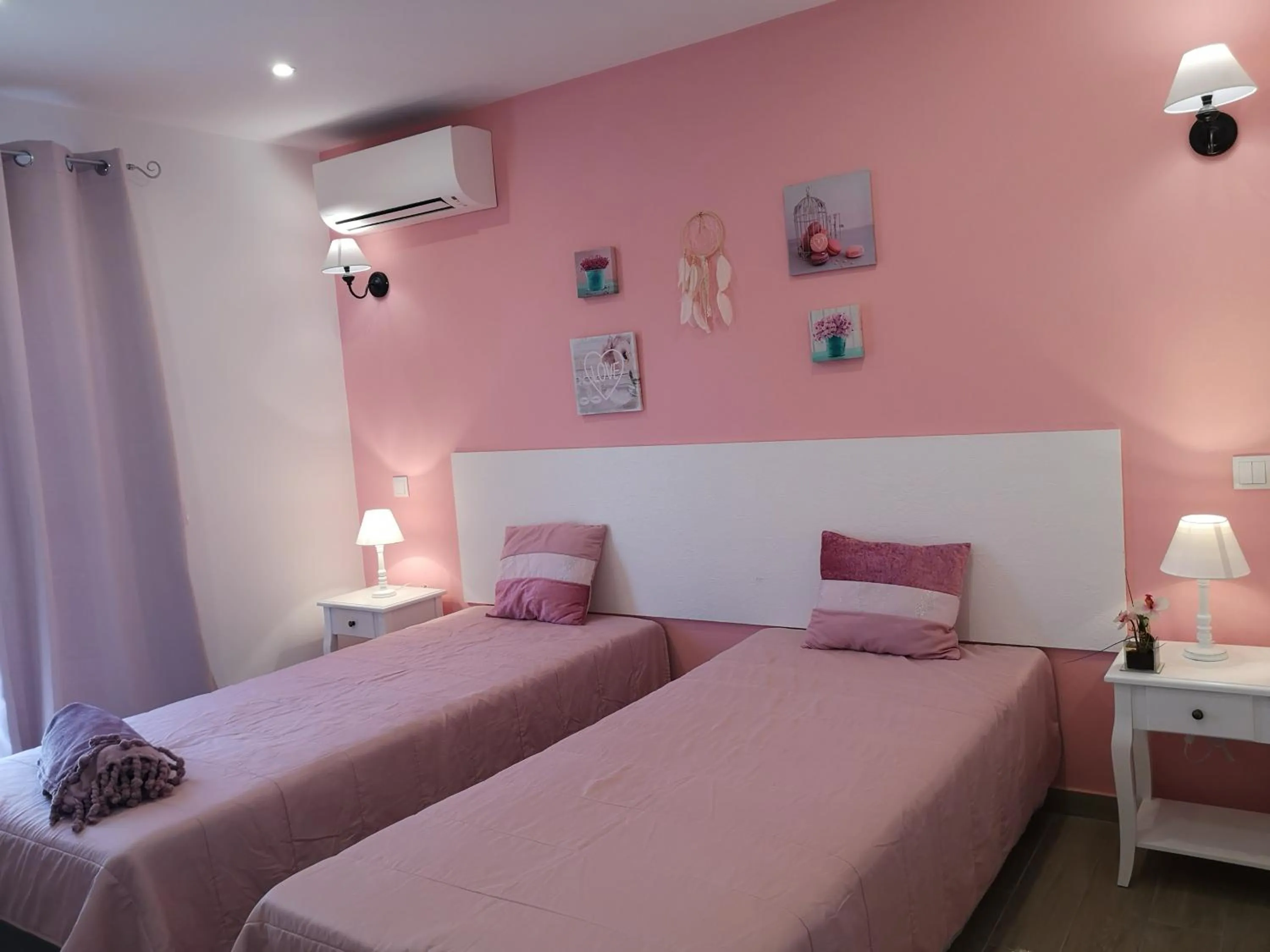 Bed in Sensations Guesthouse