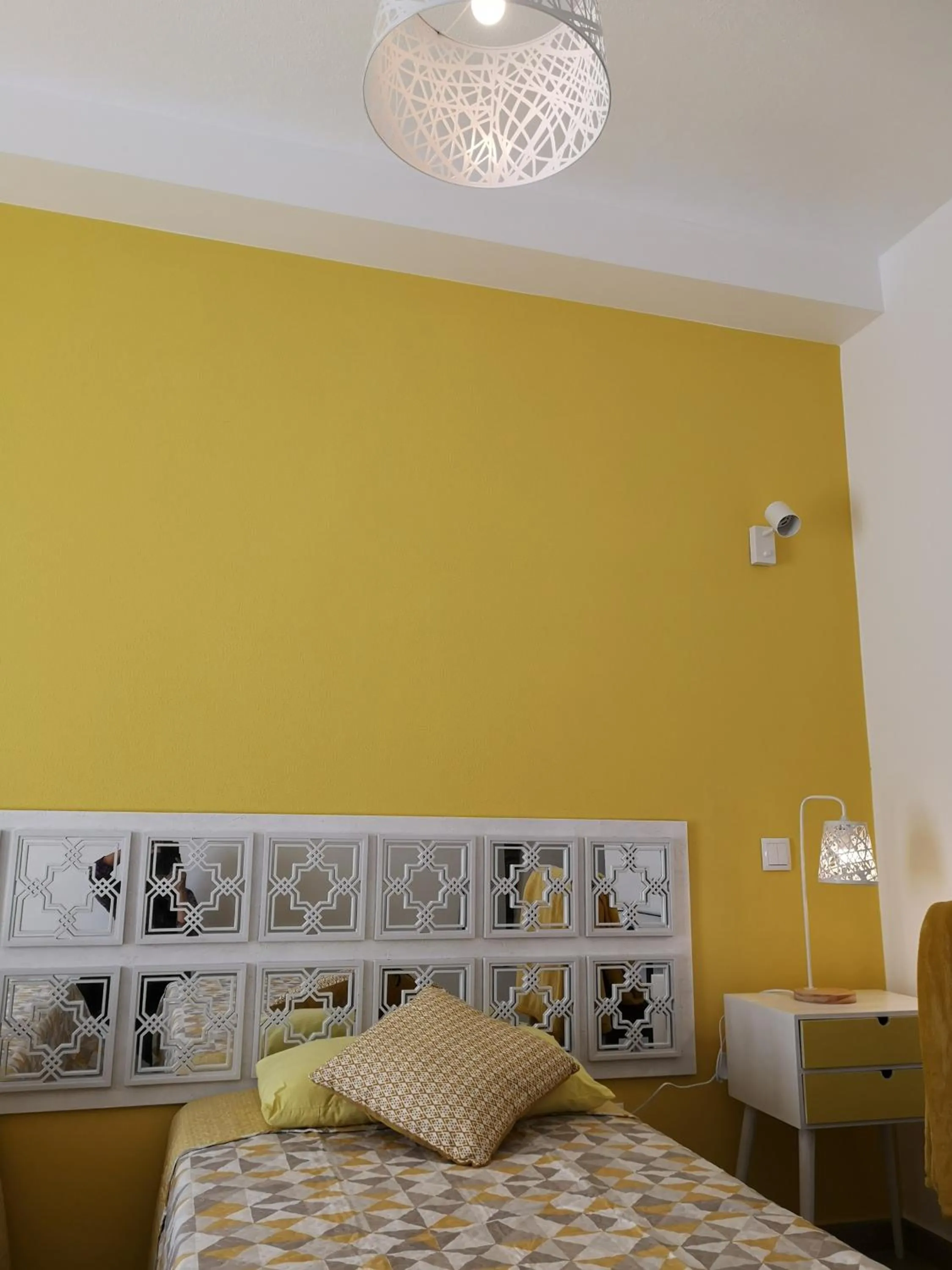 Bed in Sensations Guesthouse