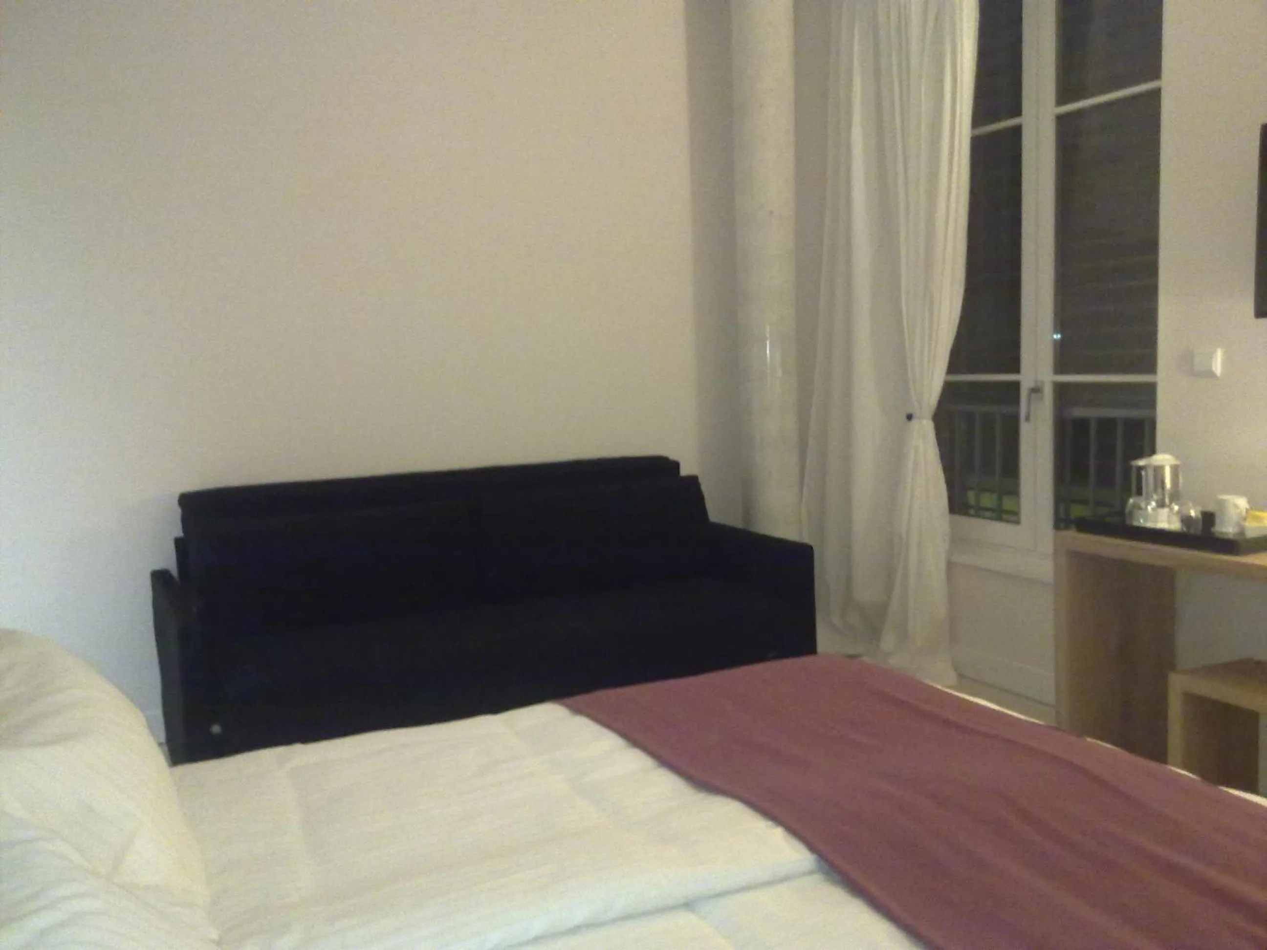 Photo of the whole room, Bed in L'Armateur